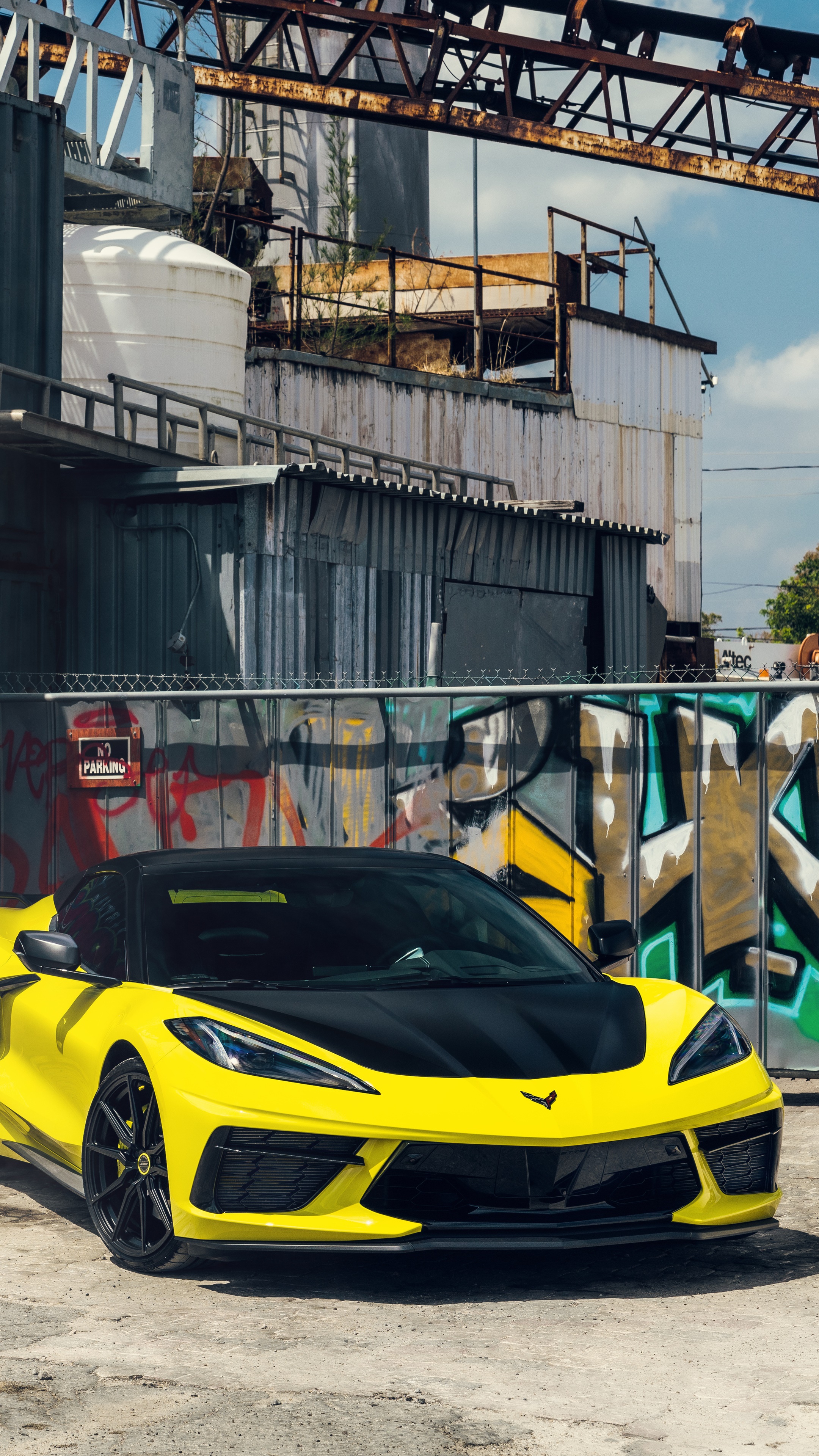 Yellow Chevrolet Corvette C8 in front of graffiti HD Phone Wallpaper