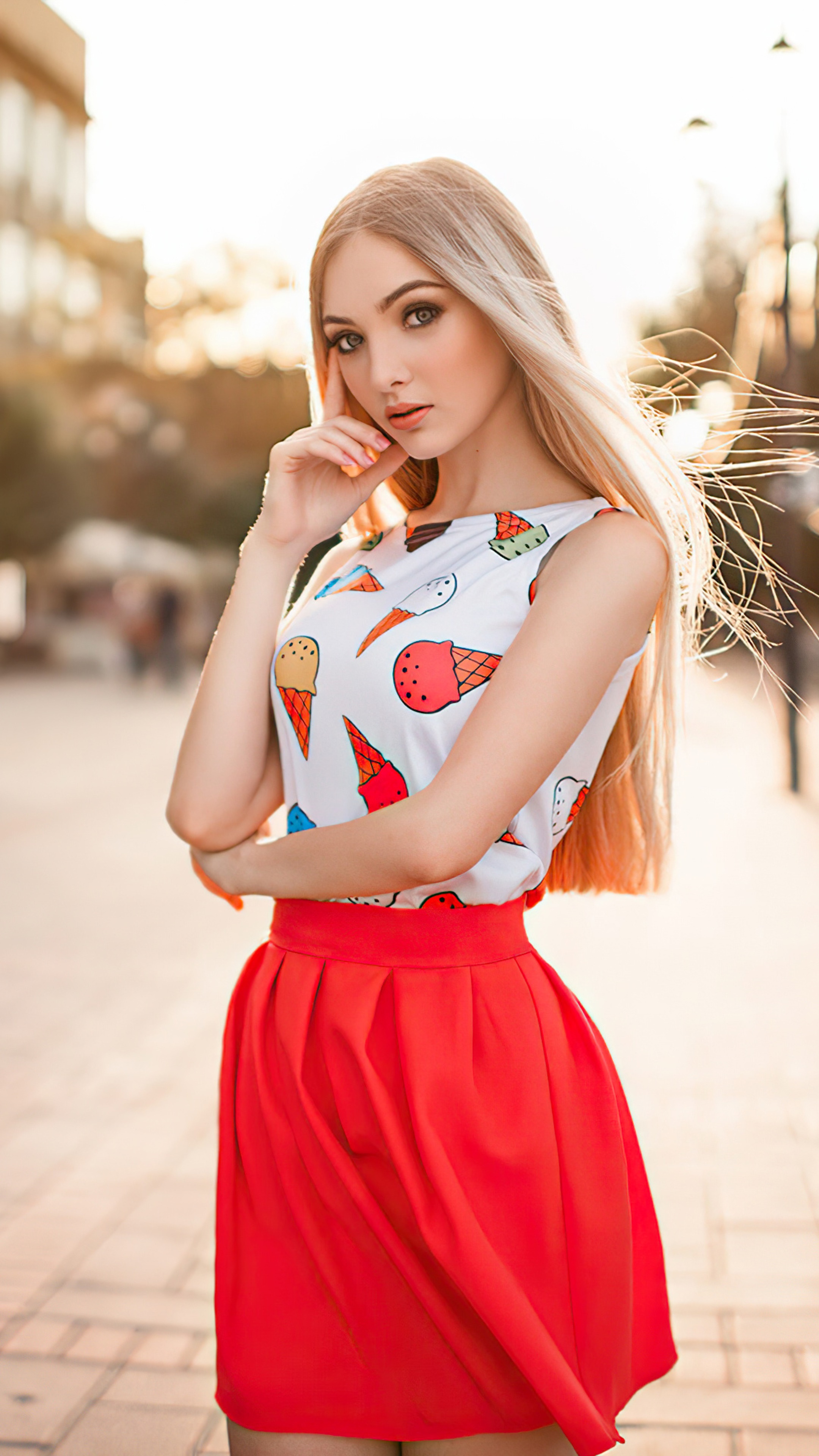 Blonde girl in ice cream print top and red skirt HD Phone Wallpaper