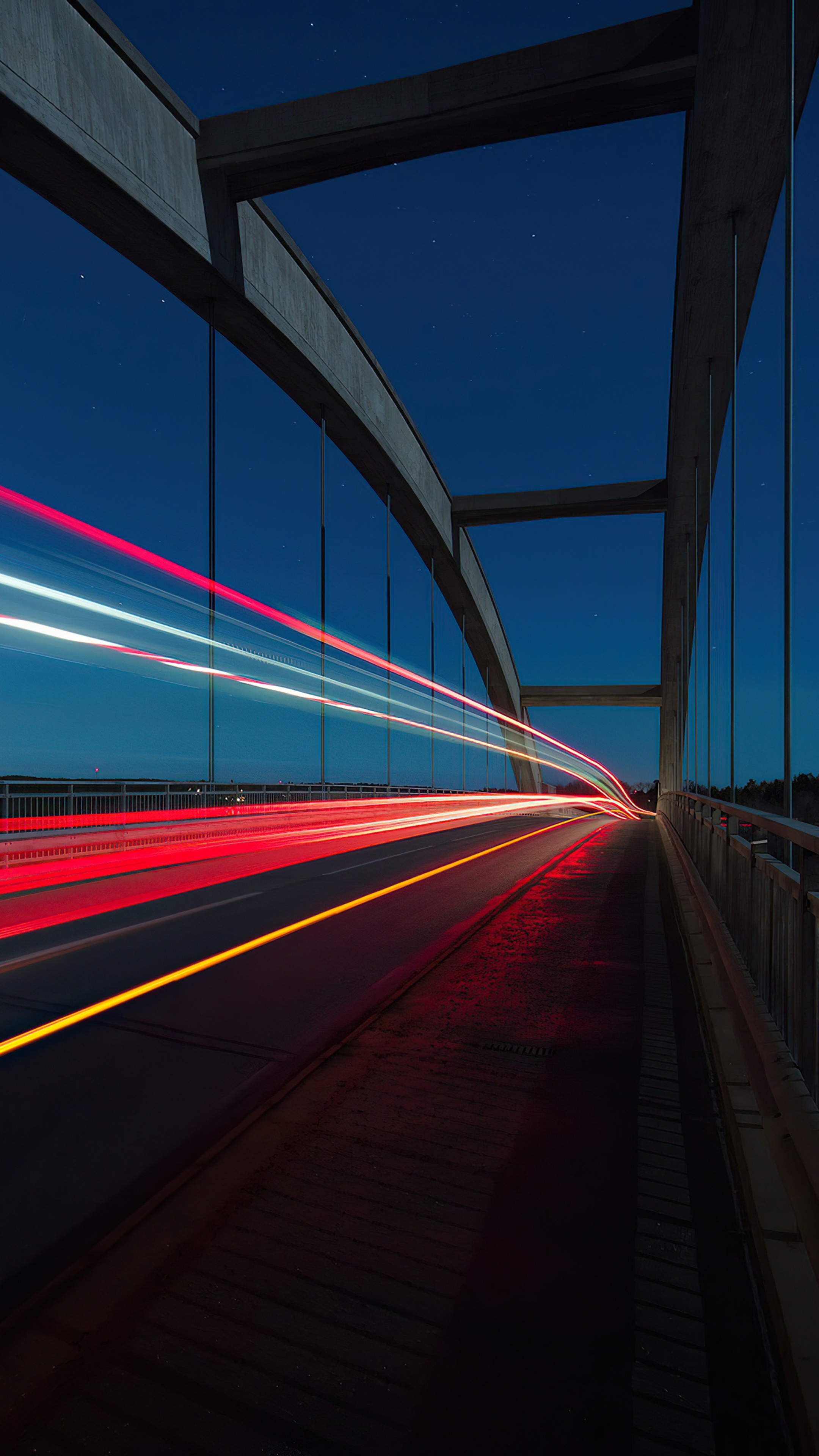 Long exposure of car light trails on a bridge at night HD Phone Wallpaper