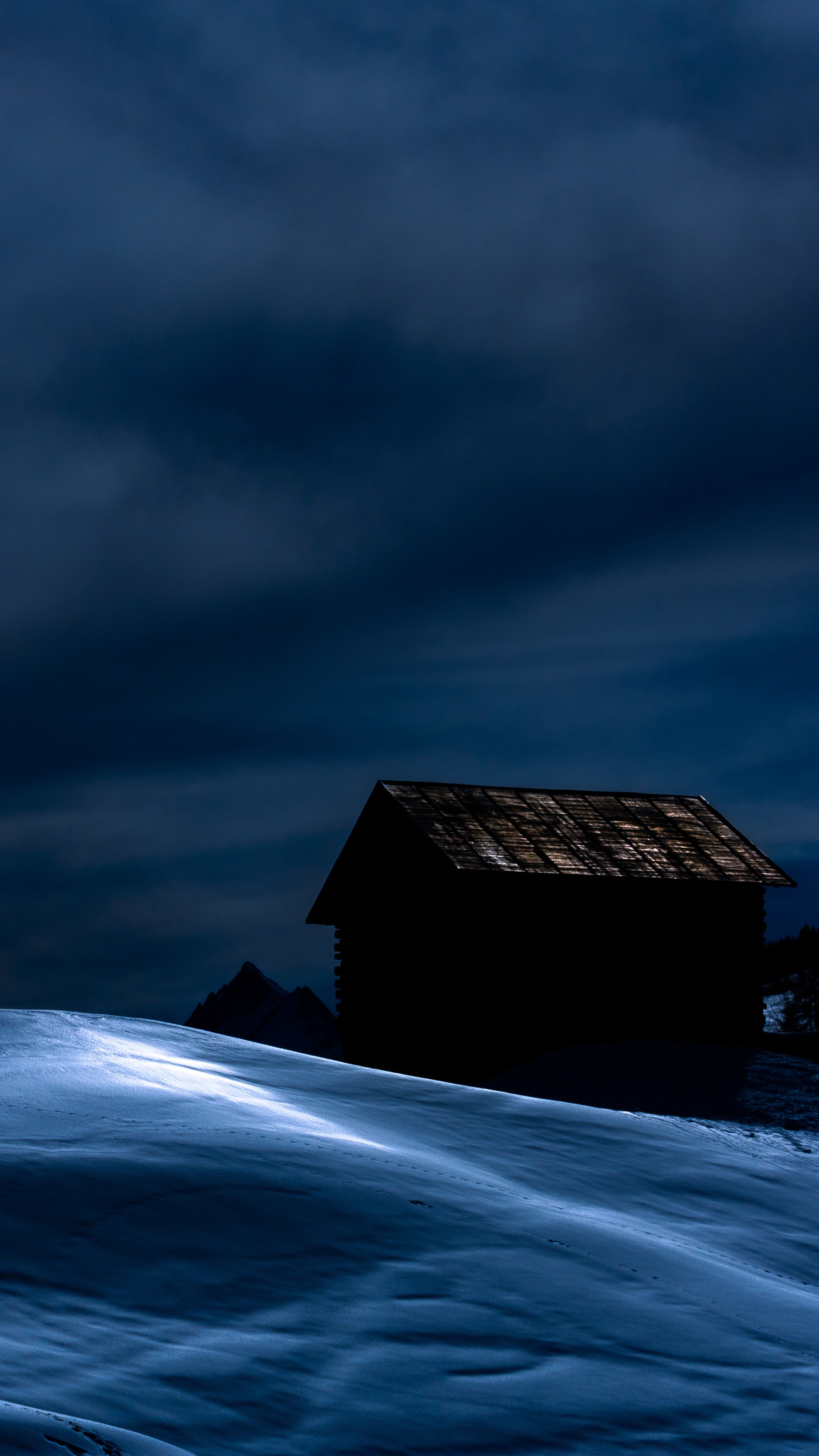 Wooden cabin on snowy hill at dusk HD Phone Wallpaper