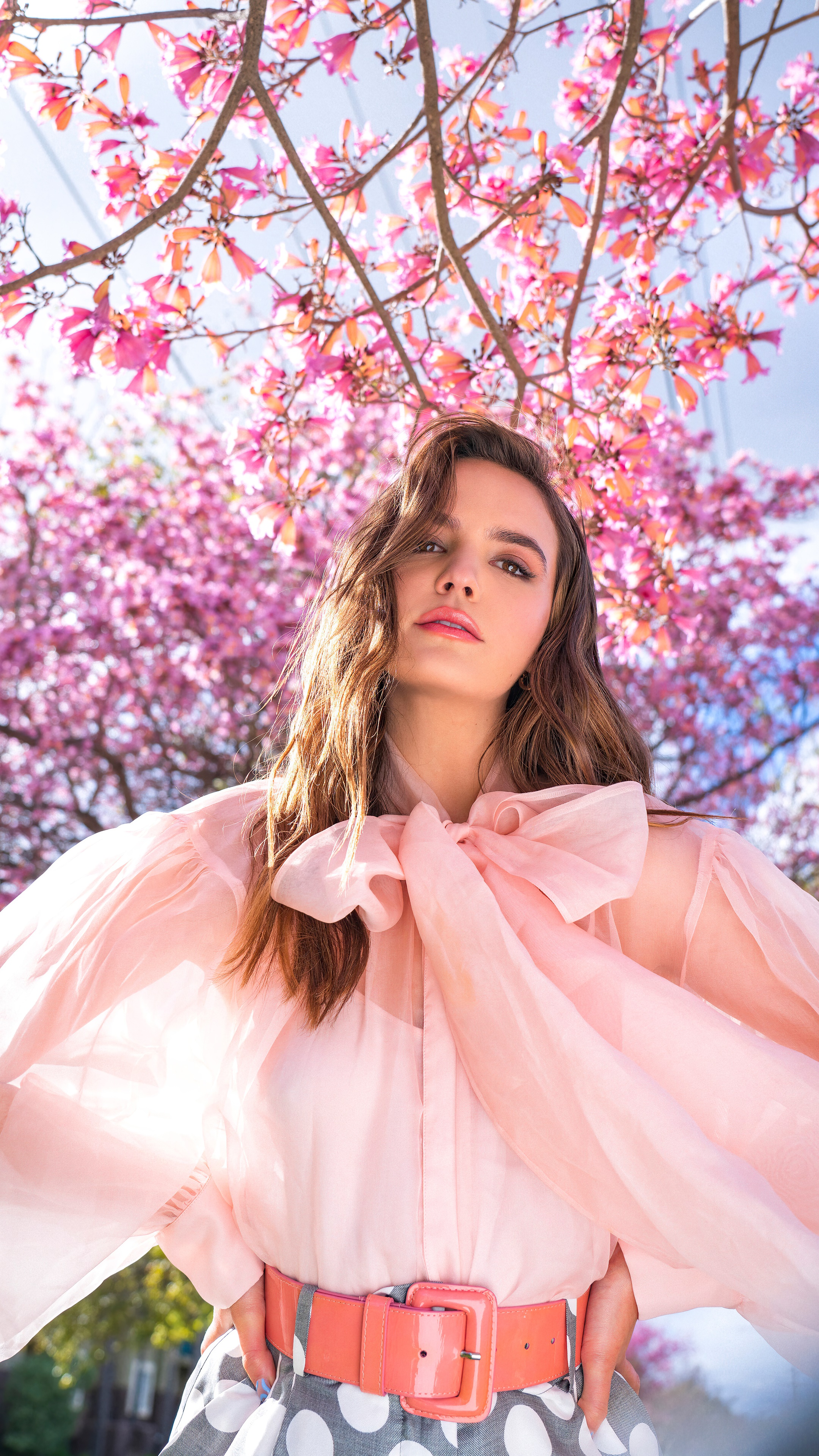 Bailee Madison in pink blouse and coral belt HD Phone Wallpaper
