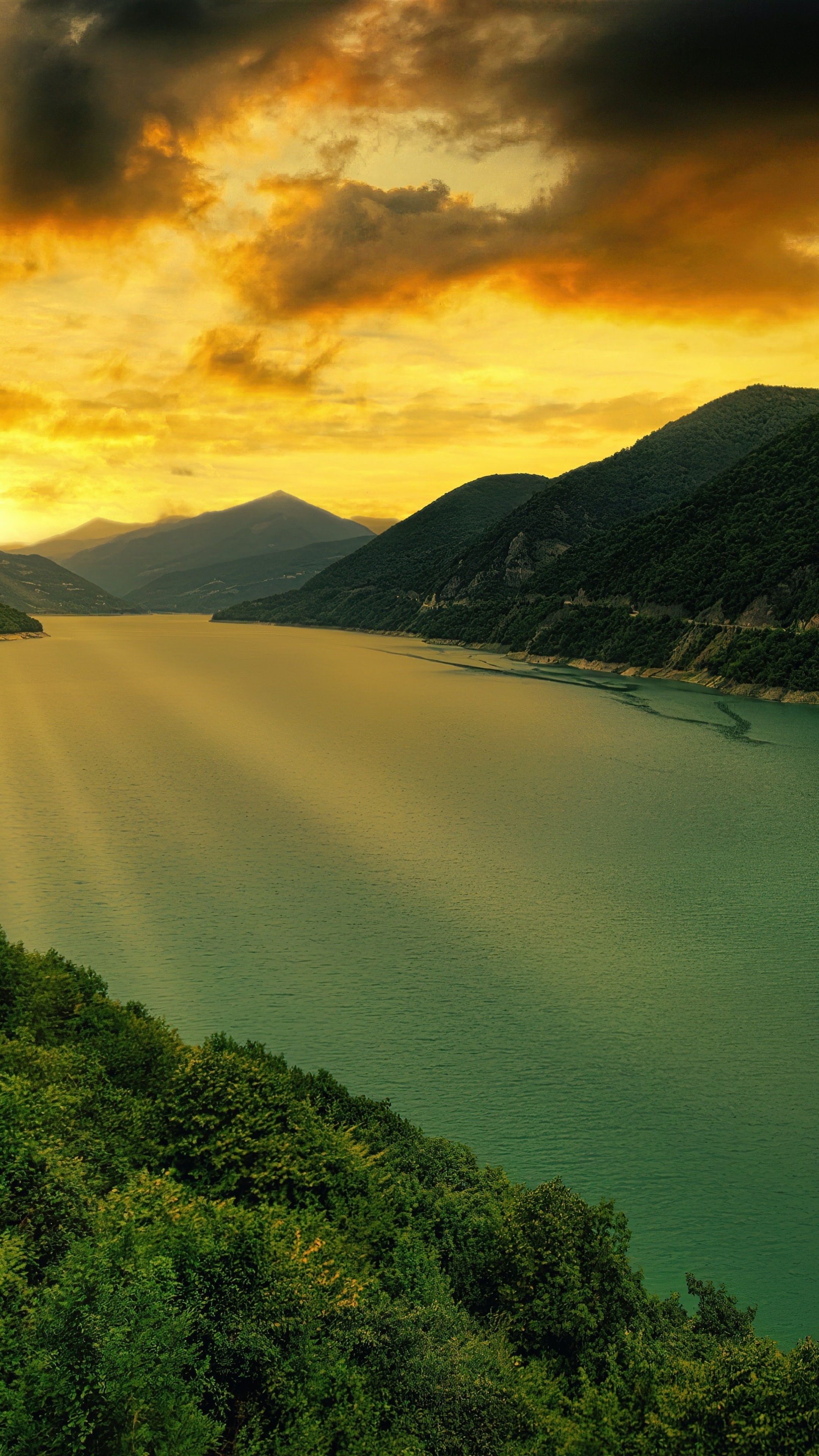 Lake and mountains at sunset with dramatic clouds HD Phone Wallpaper