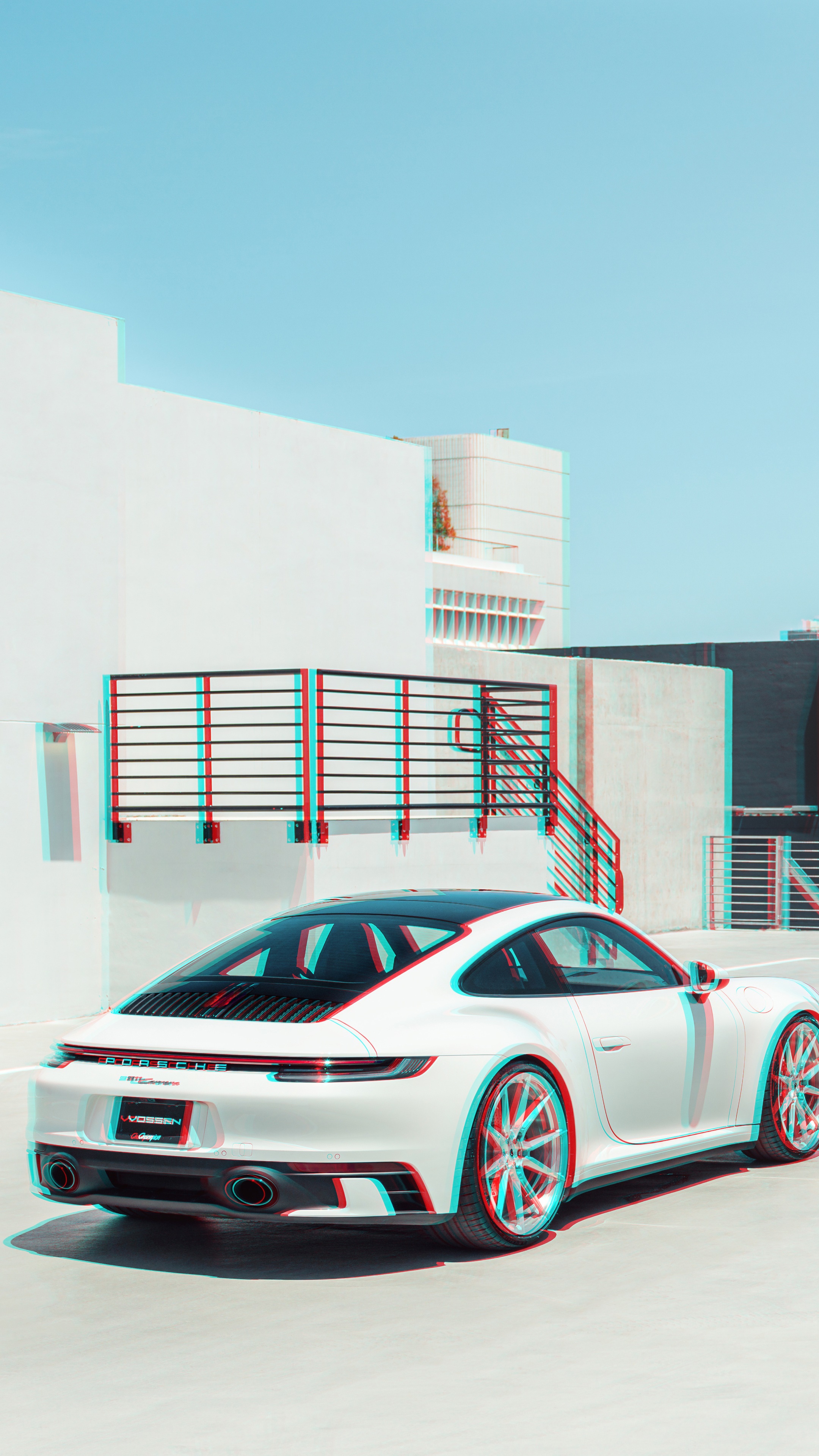 White Porsche 911 parked near a modern building HD Phone Wallpaper