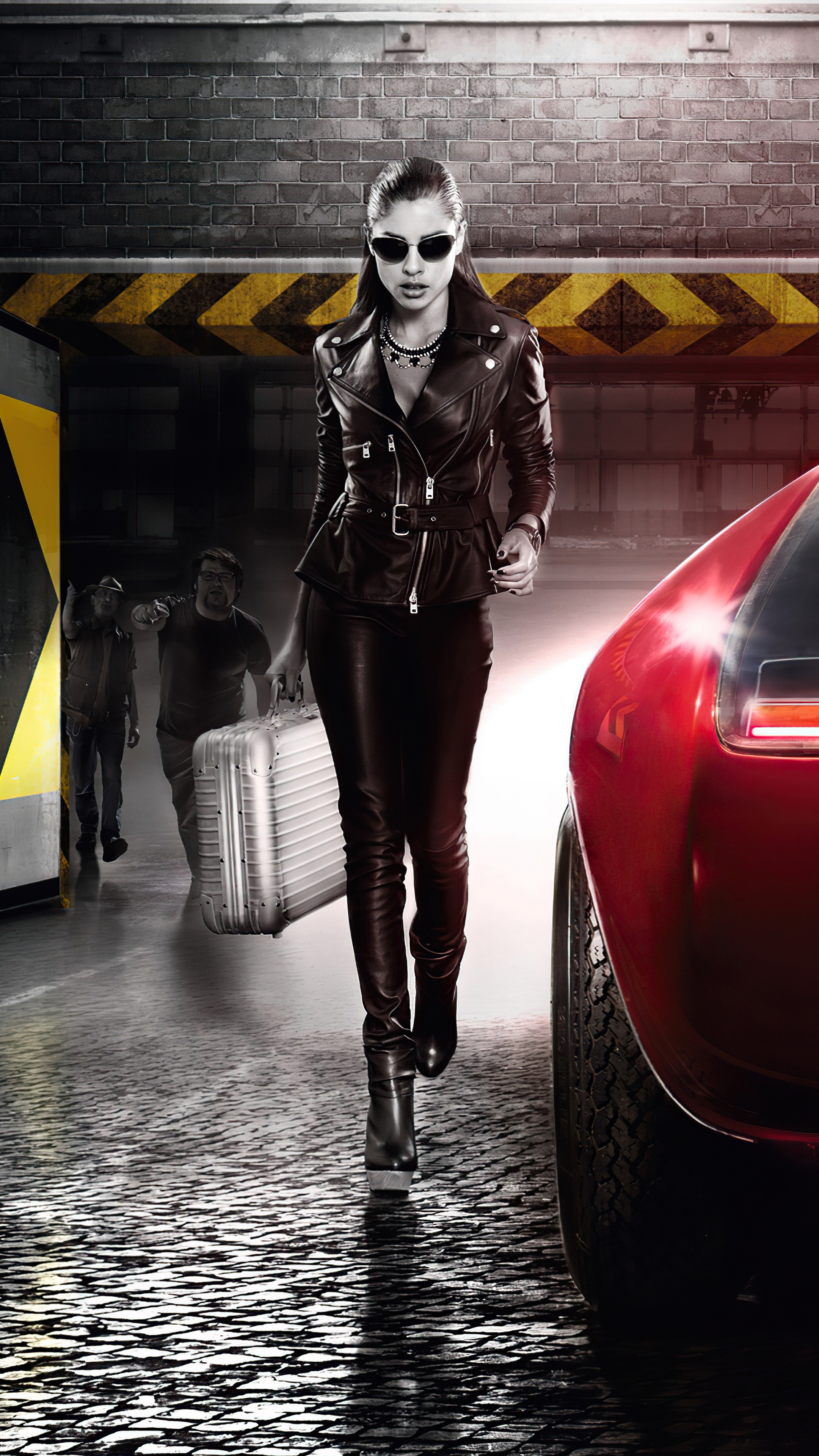 Woman in leather carrying a briefcase with men in background HD Phone Wallpaper