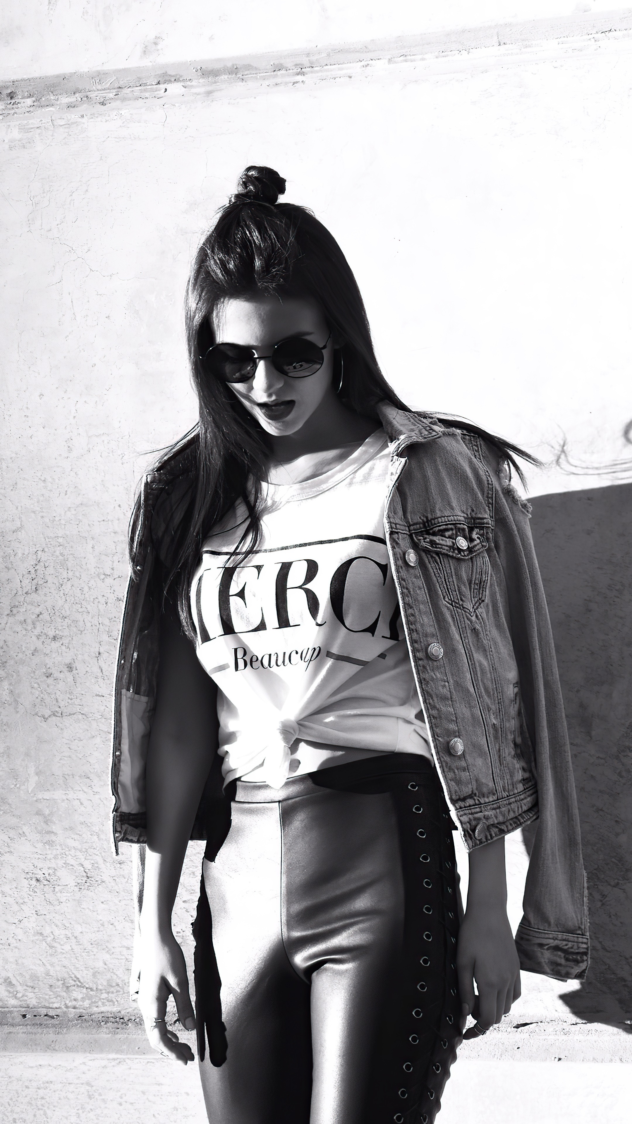 Victoria Justice in a denim jacket and leather pants HD Phone Wallpaper