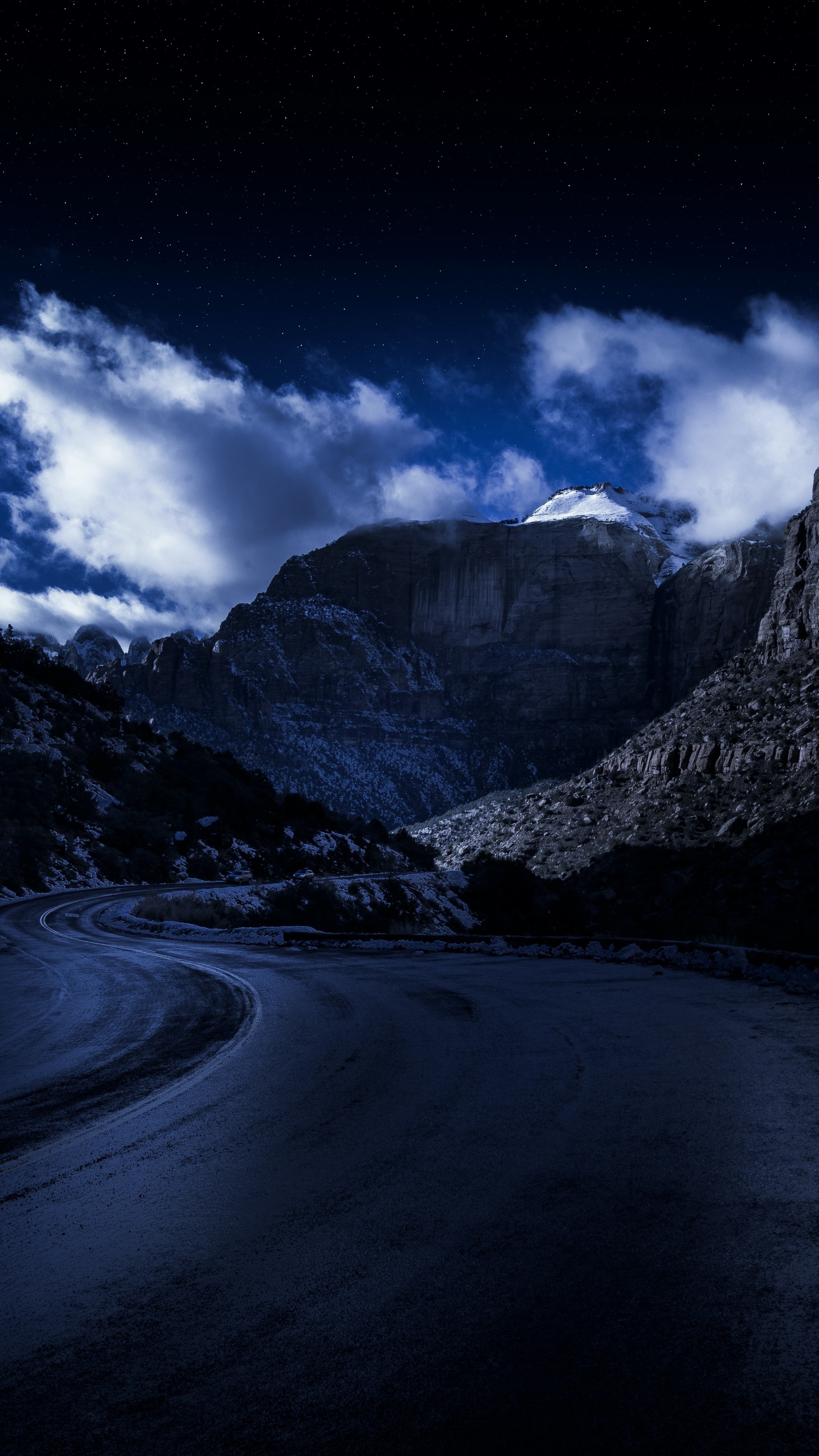 Snowy mountain road at night HD Phone Wallpaper