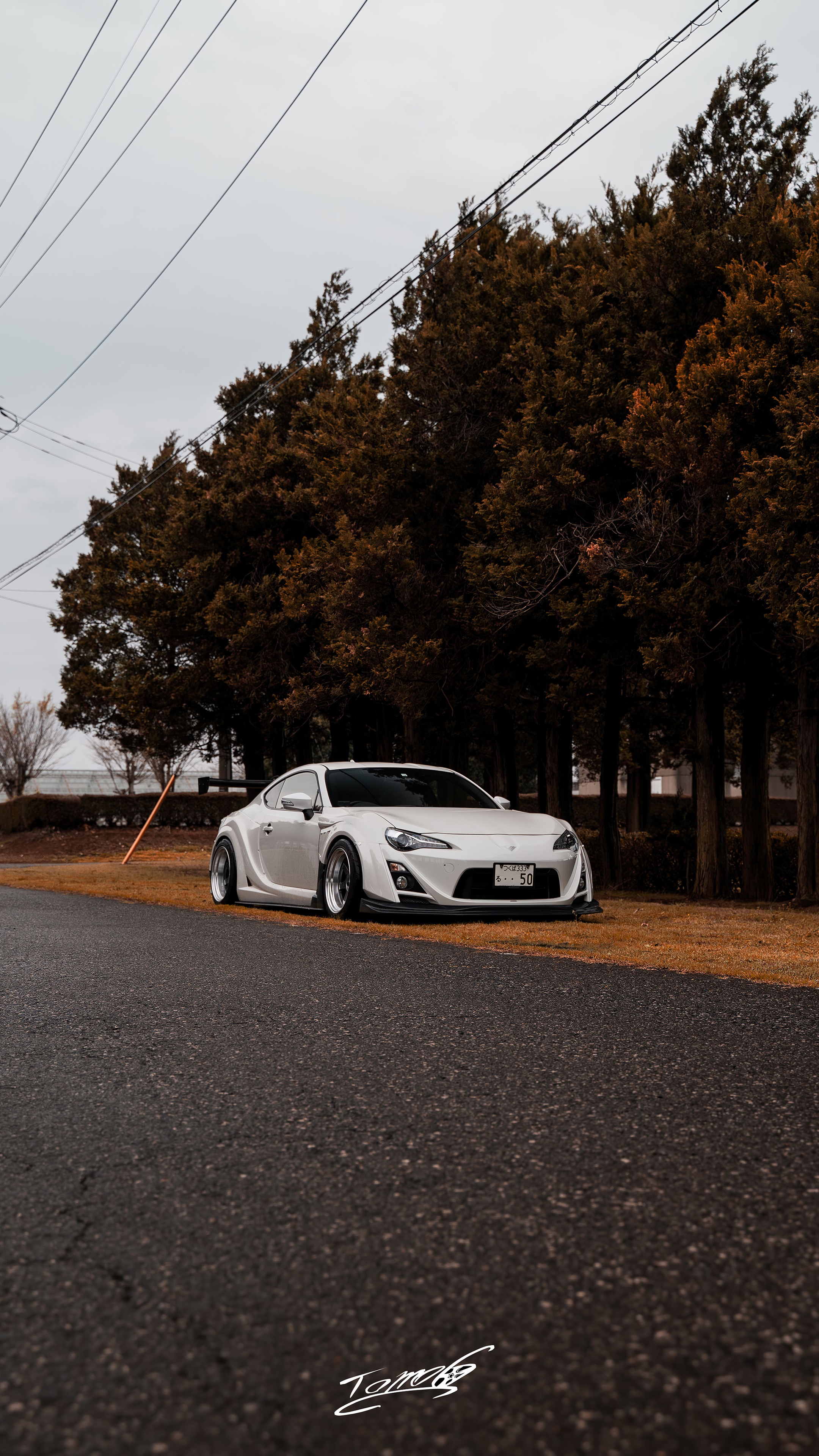 White Toyota Supra parked by trees HD Phone Wallpaper
