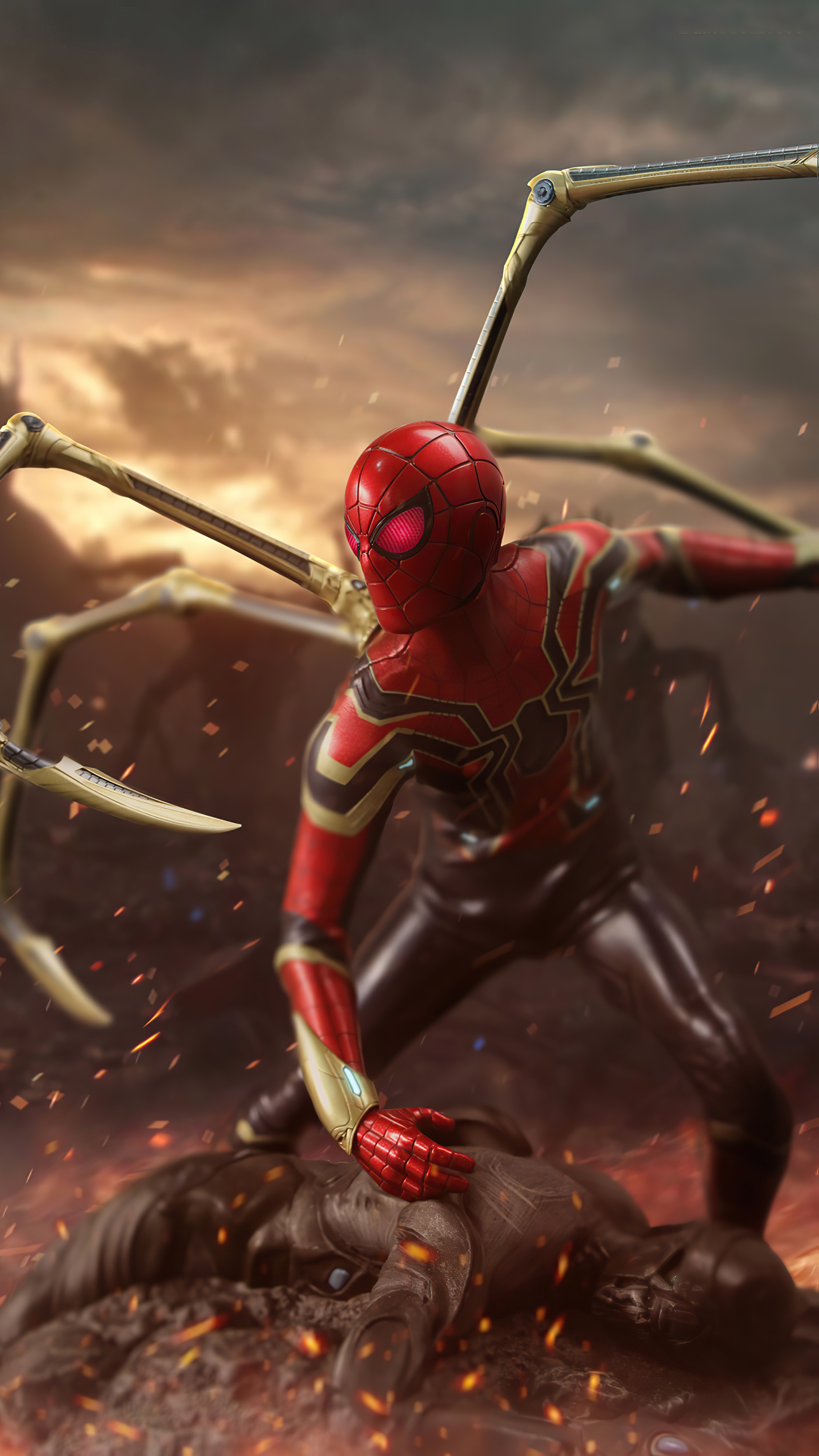 Spider-Man in Iron Spider suit standing over a defeated opponent HD Phone Wallpaper