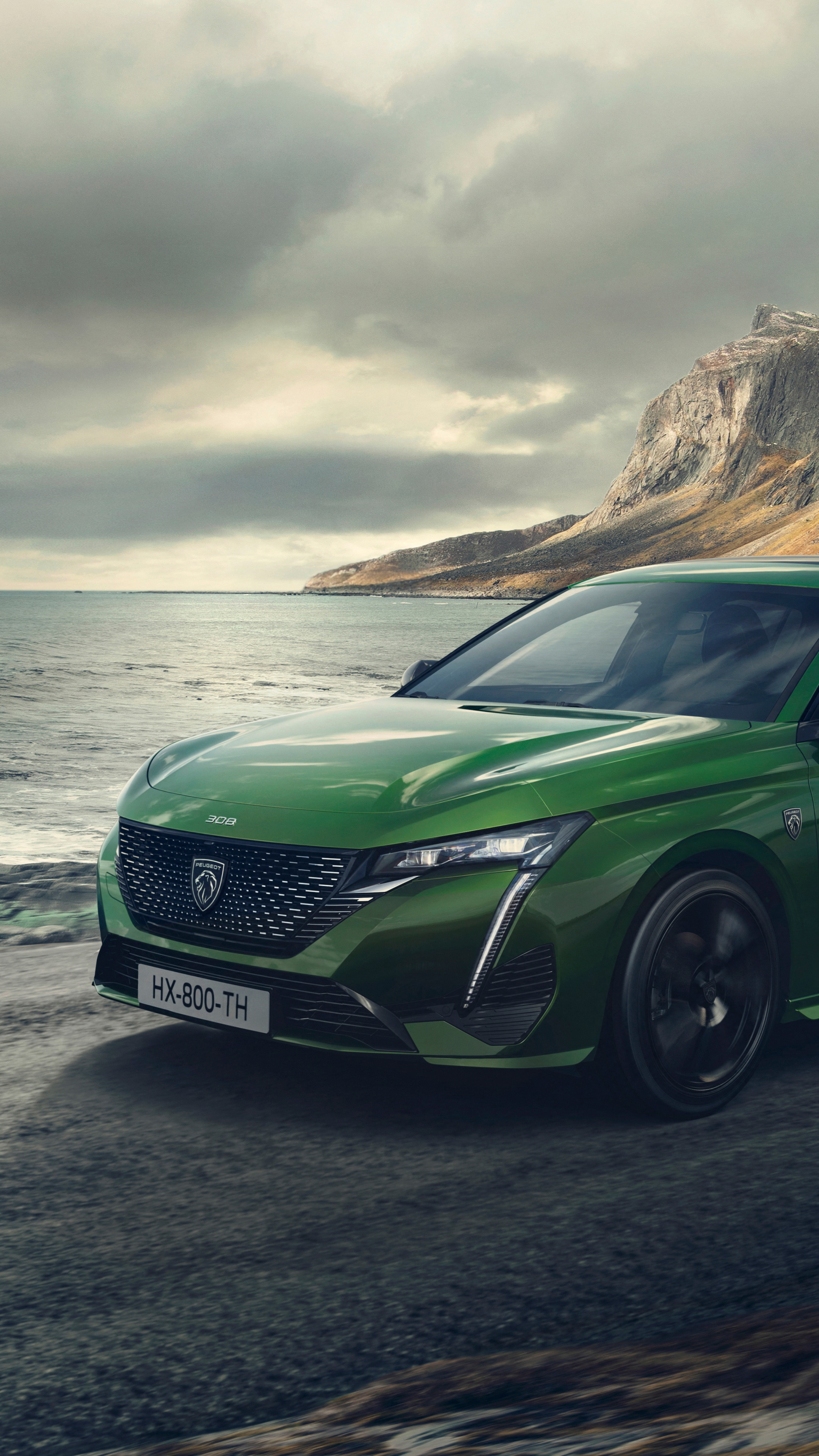 Green Peugeot 308 parked by the sea HD Phone Wallpaper