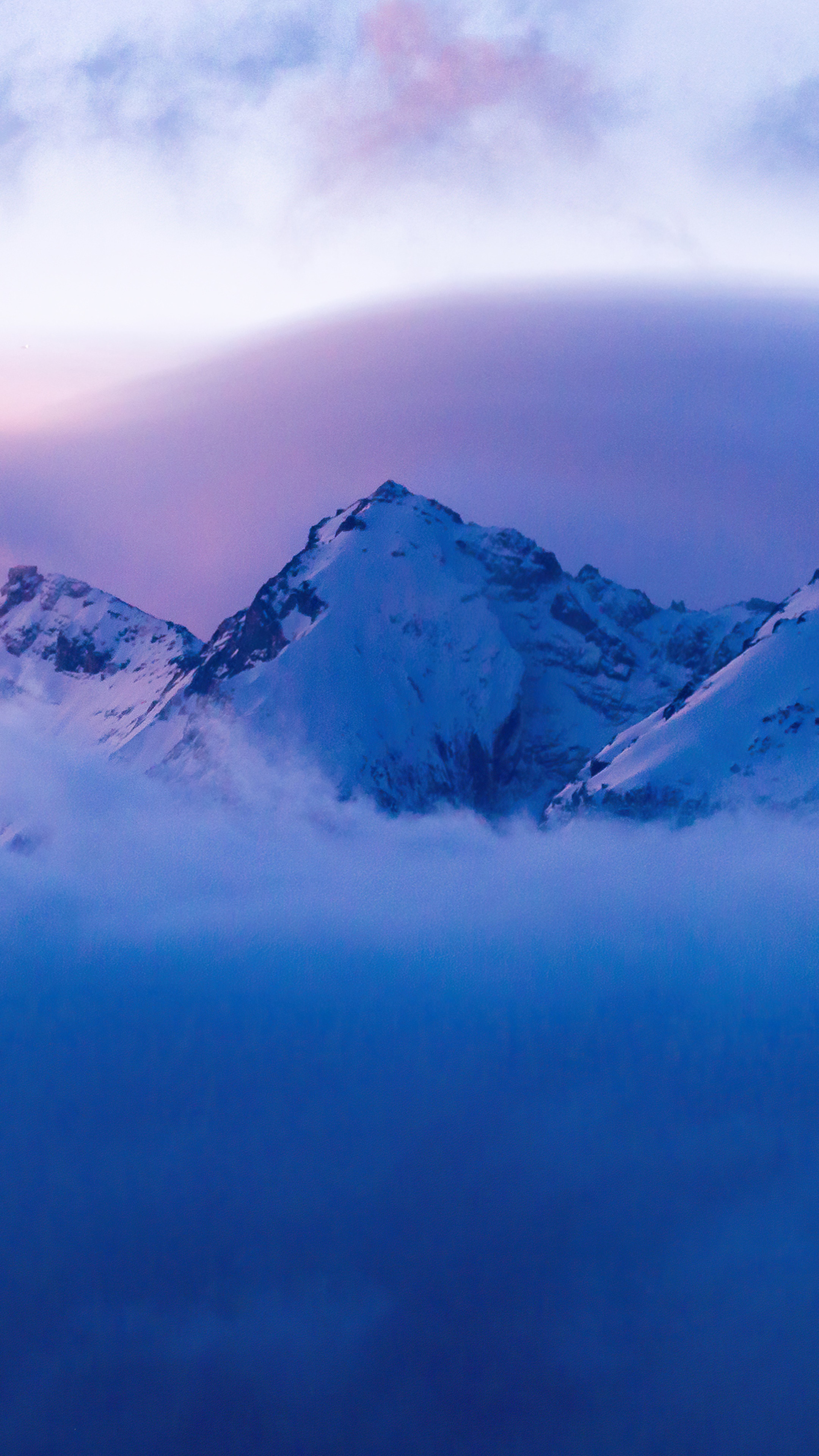 Snow-capped mountains shrouded in mist HD Phone Wallpaper