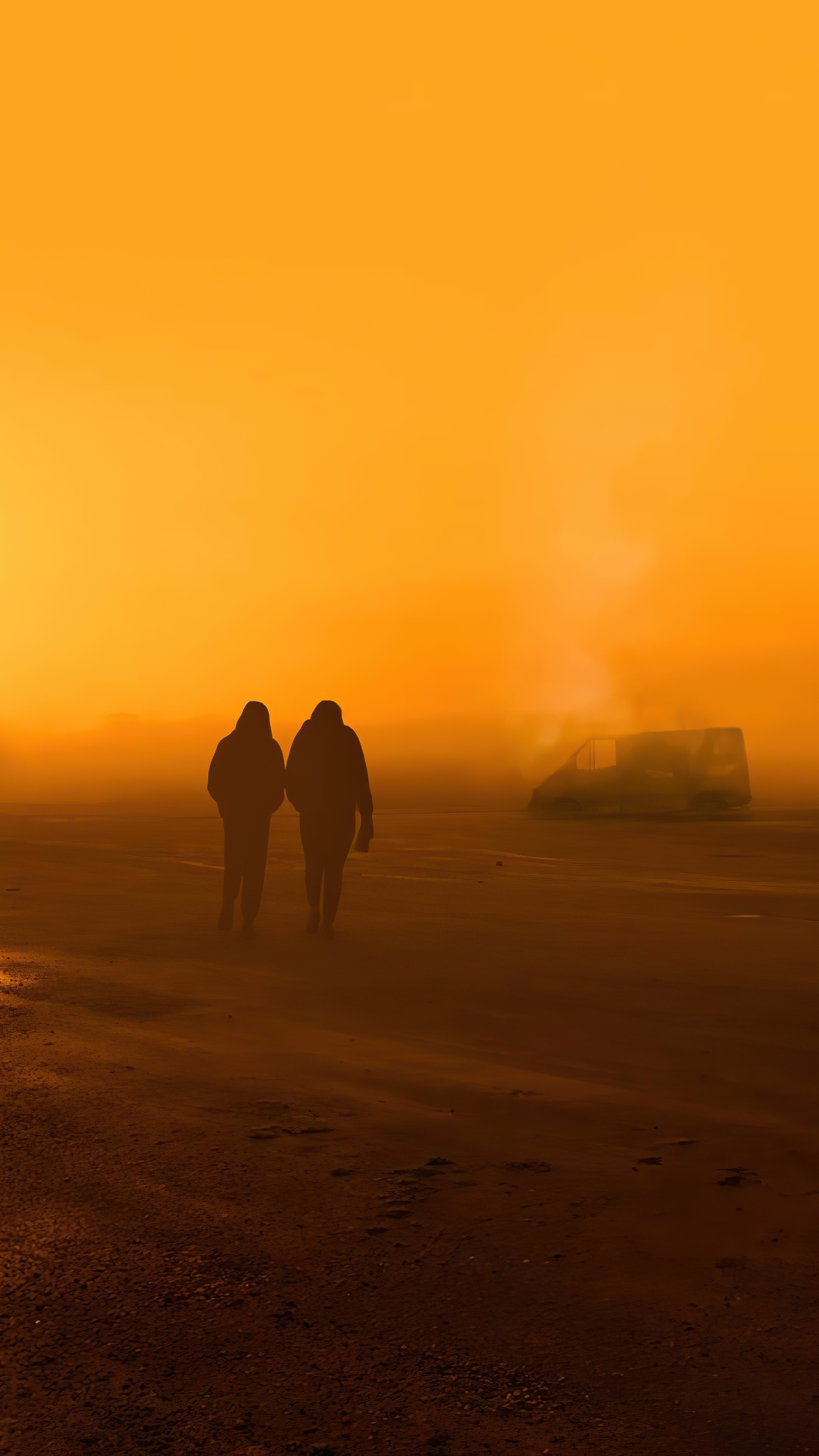 Two figures walking in orange fog with a vehicle HD Phone Wallpaper