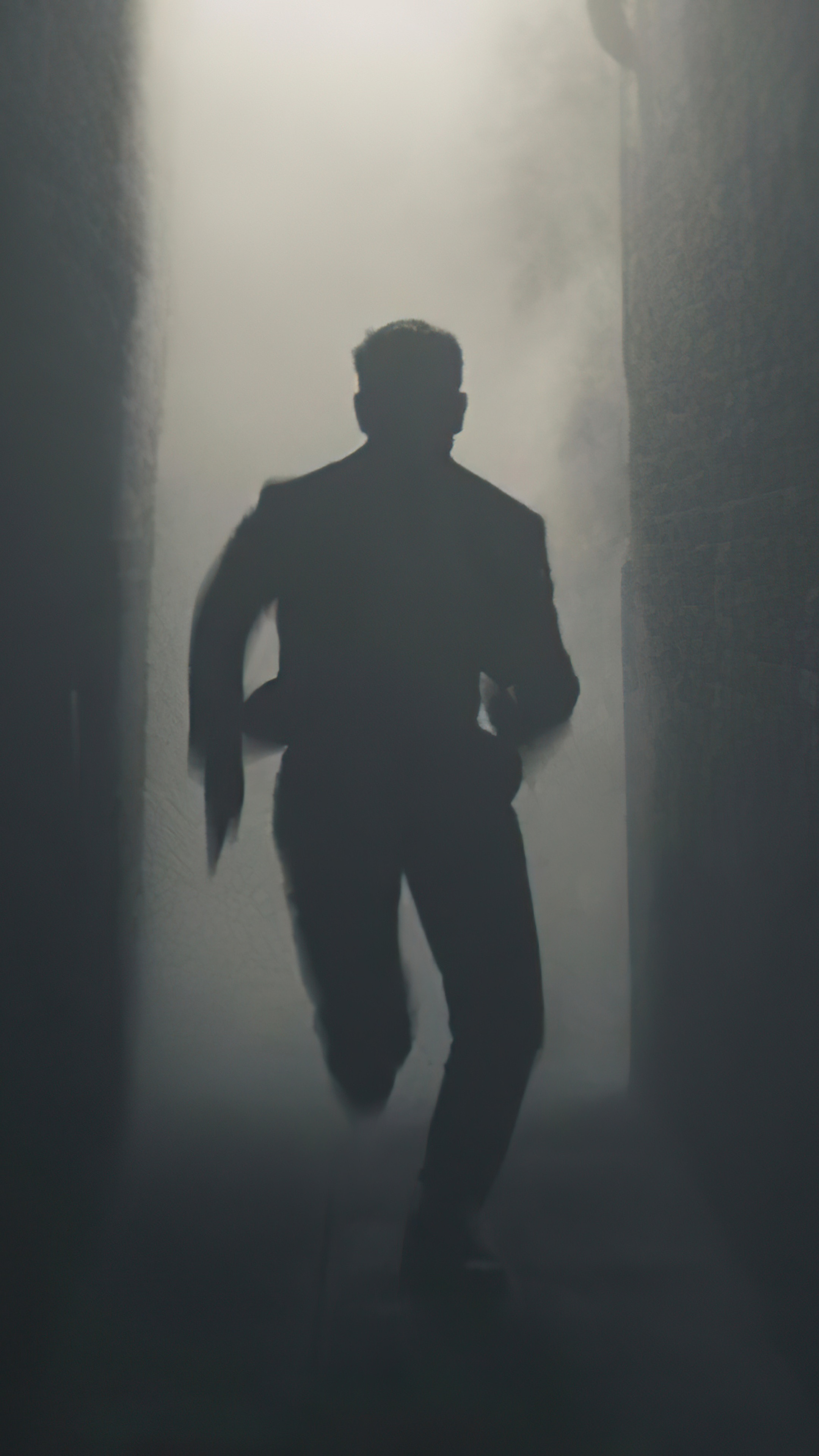 Man in suit running through smoke HD Phone Wallpaper