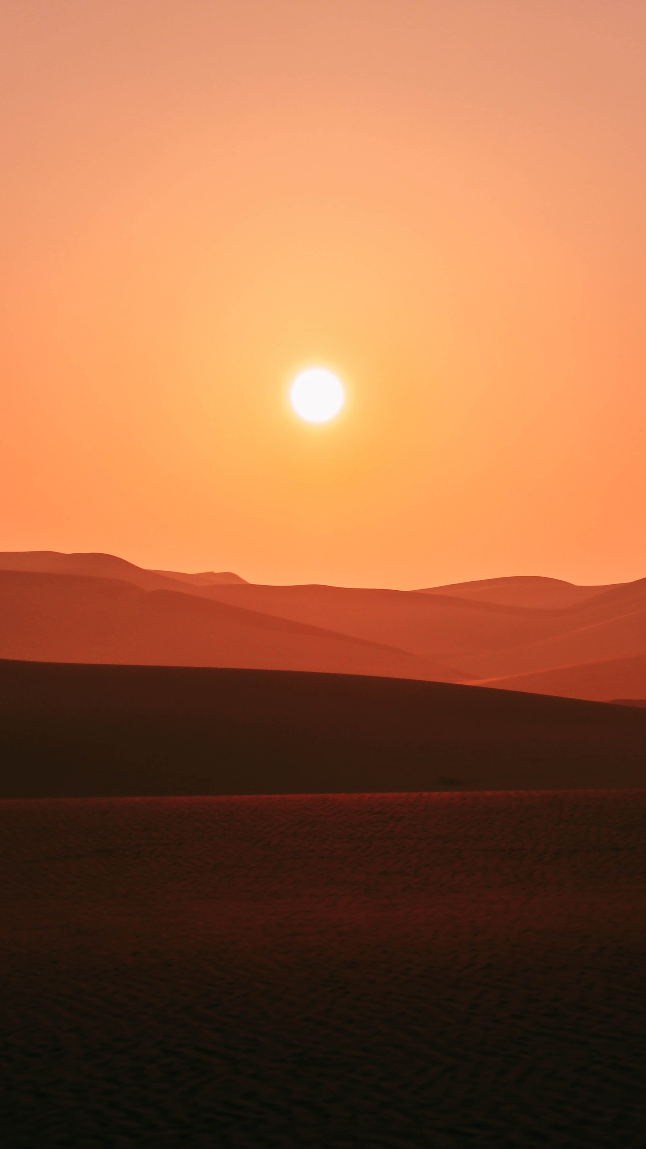 Desert dunes at sunset with sun HD Phone Wallpaper