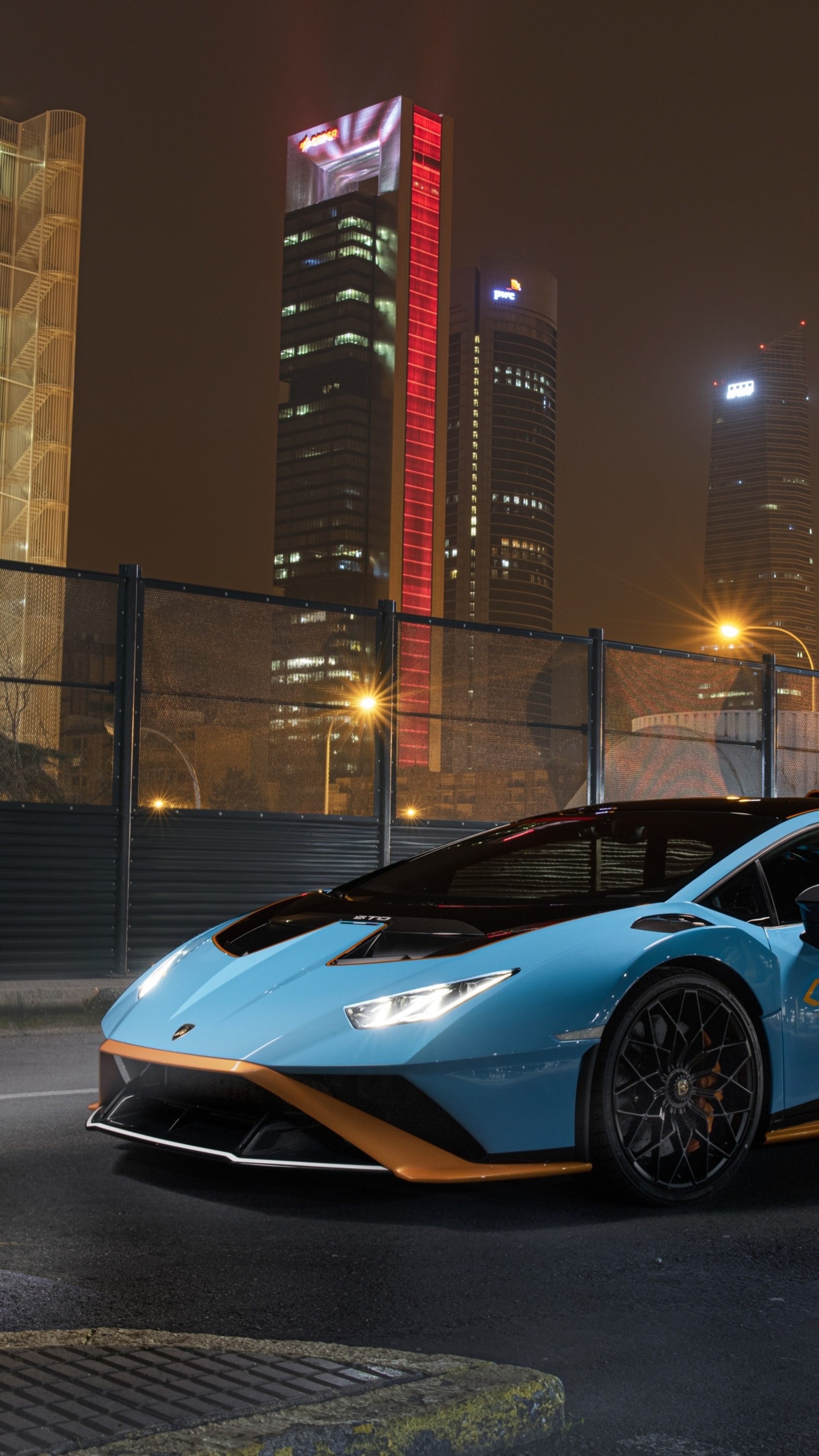 Lamborghini Huracan STO in city at night HD Phone Wallpaper