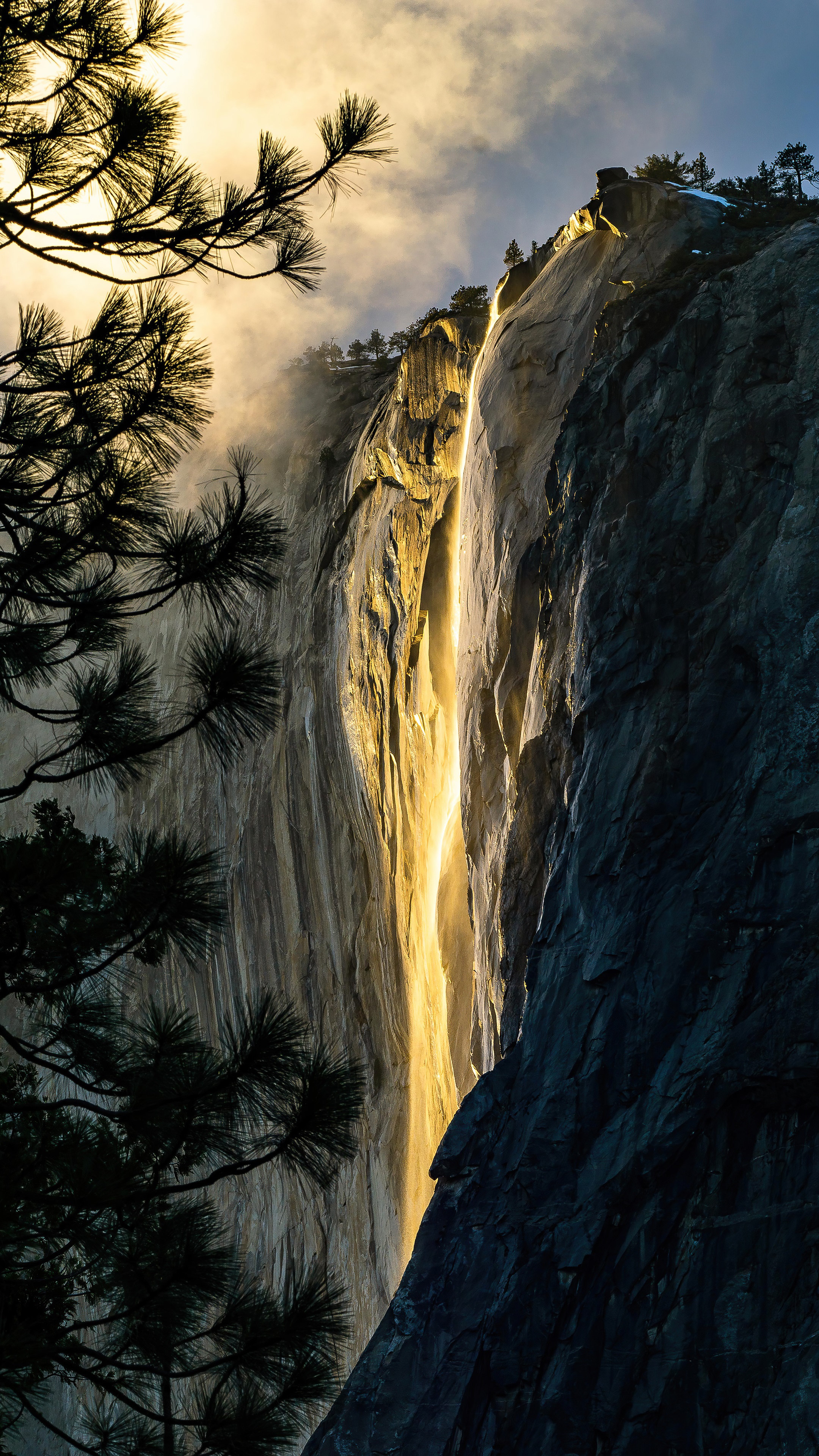 Yosemite National Park waterfall illuminated by sun HD Phone Wallpaper