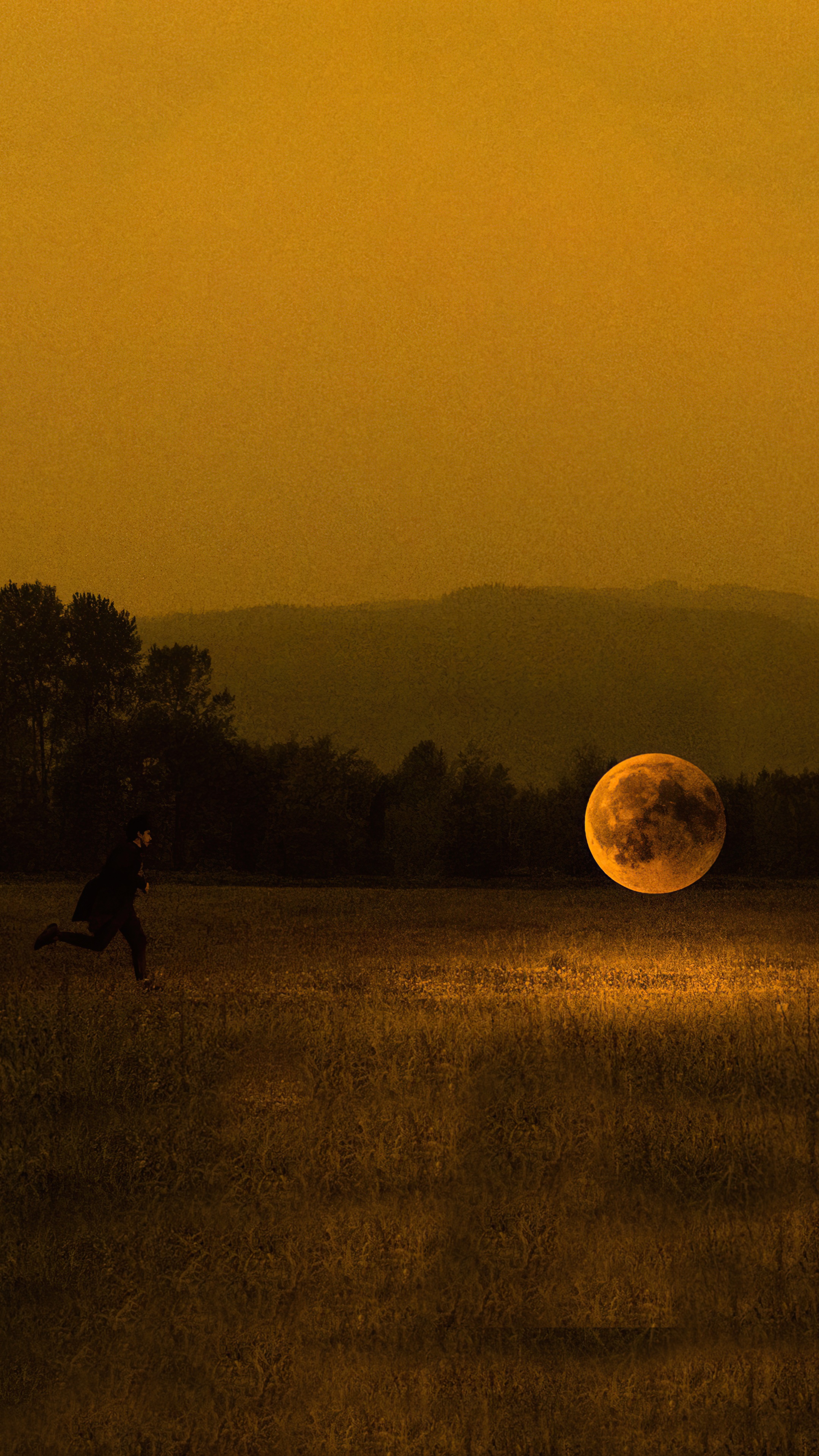 Person running towards a large moon in a field HD Phone Wallpaper