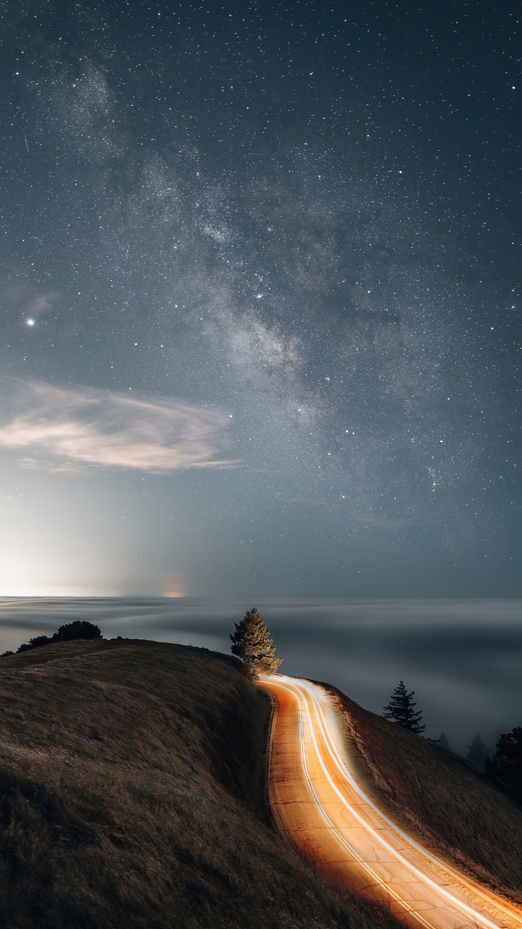 Road with light trails under the Milky Way HD Phone Wallpaper