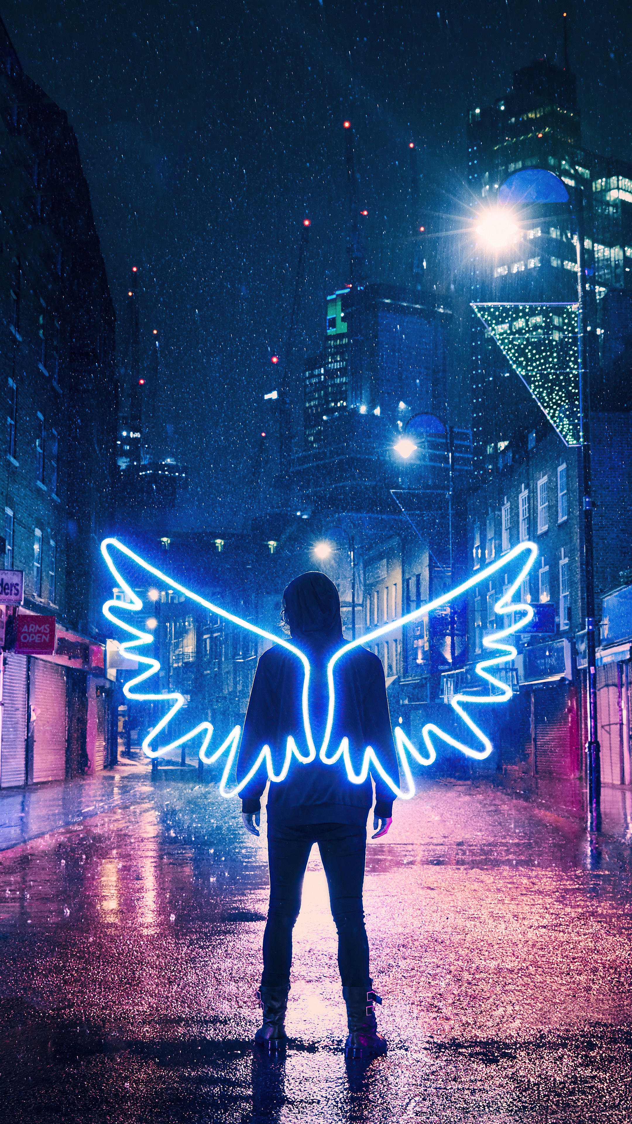 Person with neon wings in a rainy city at night HD Phone Wallpaper