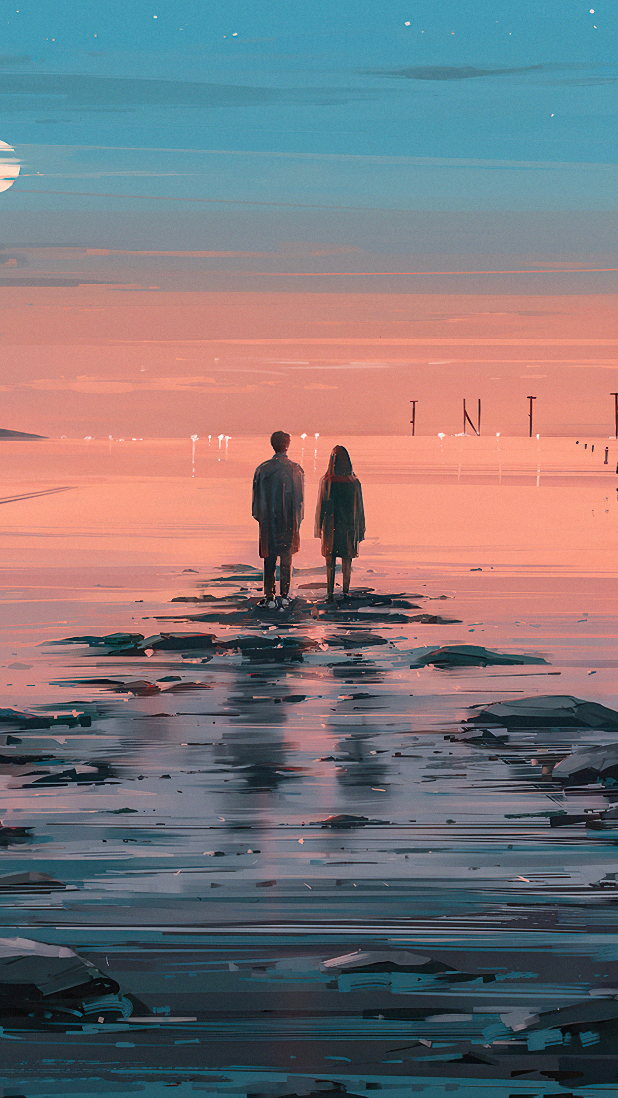 Couple standing on a rocky shore at sunset HD Phone Wallpaper