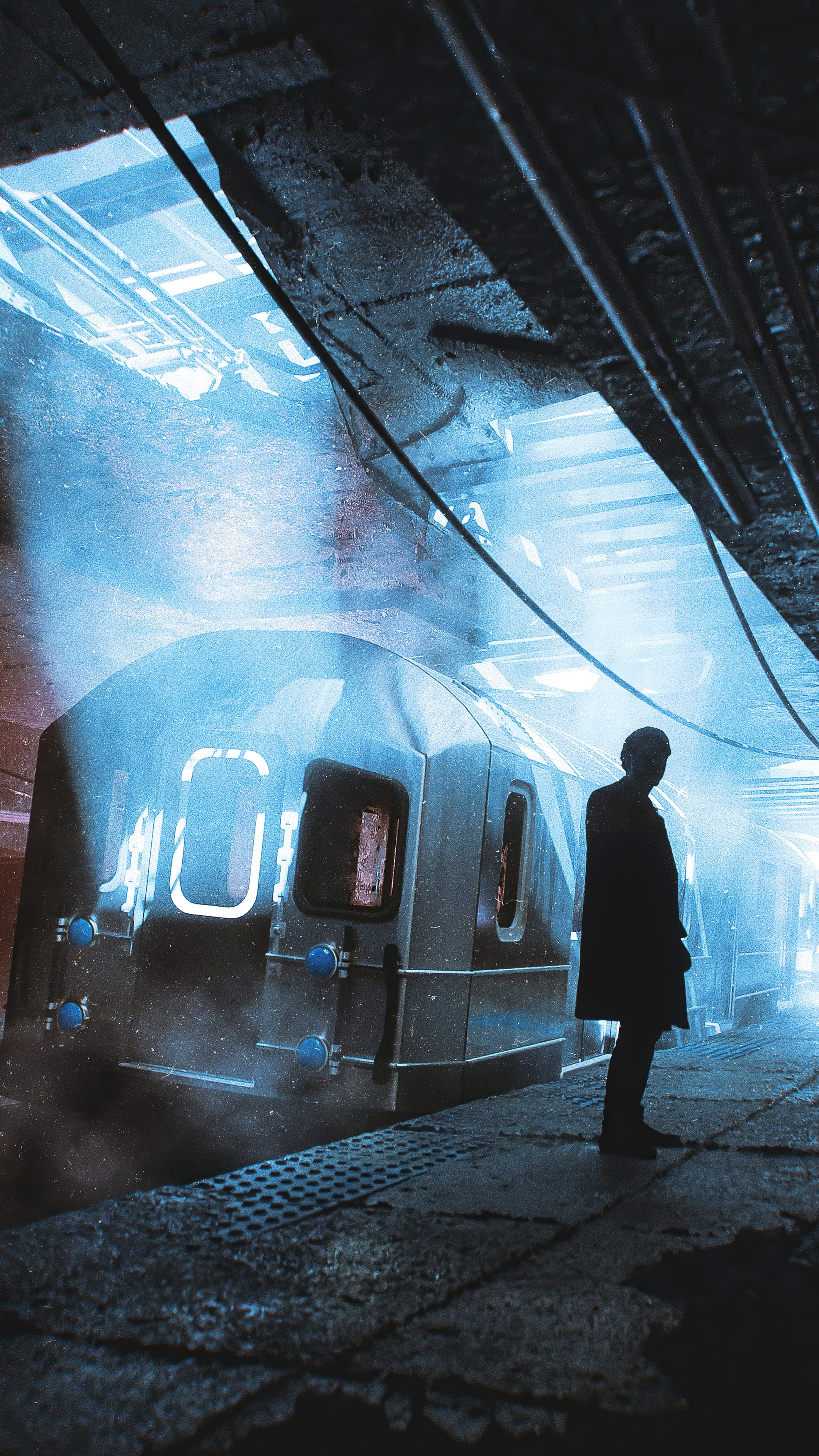 Man on a subway platform with a train HD Phone Wallpaper