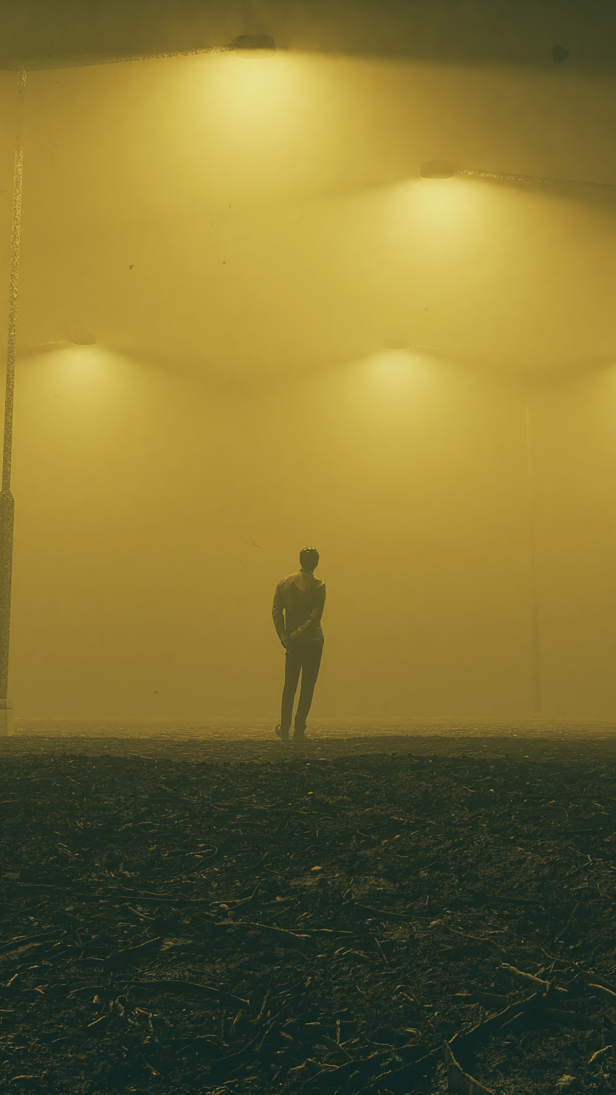 Man standing in fog with spotlights HD Phone Wallpaper