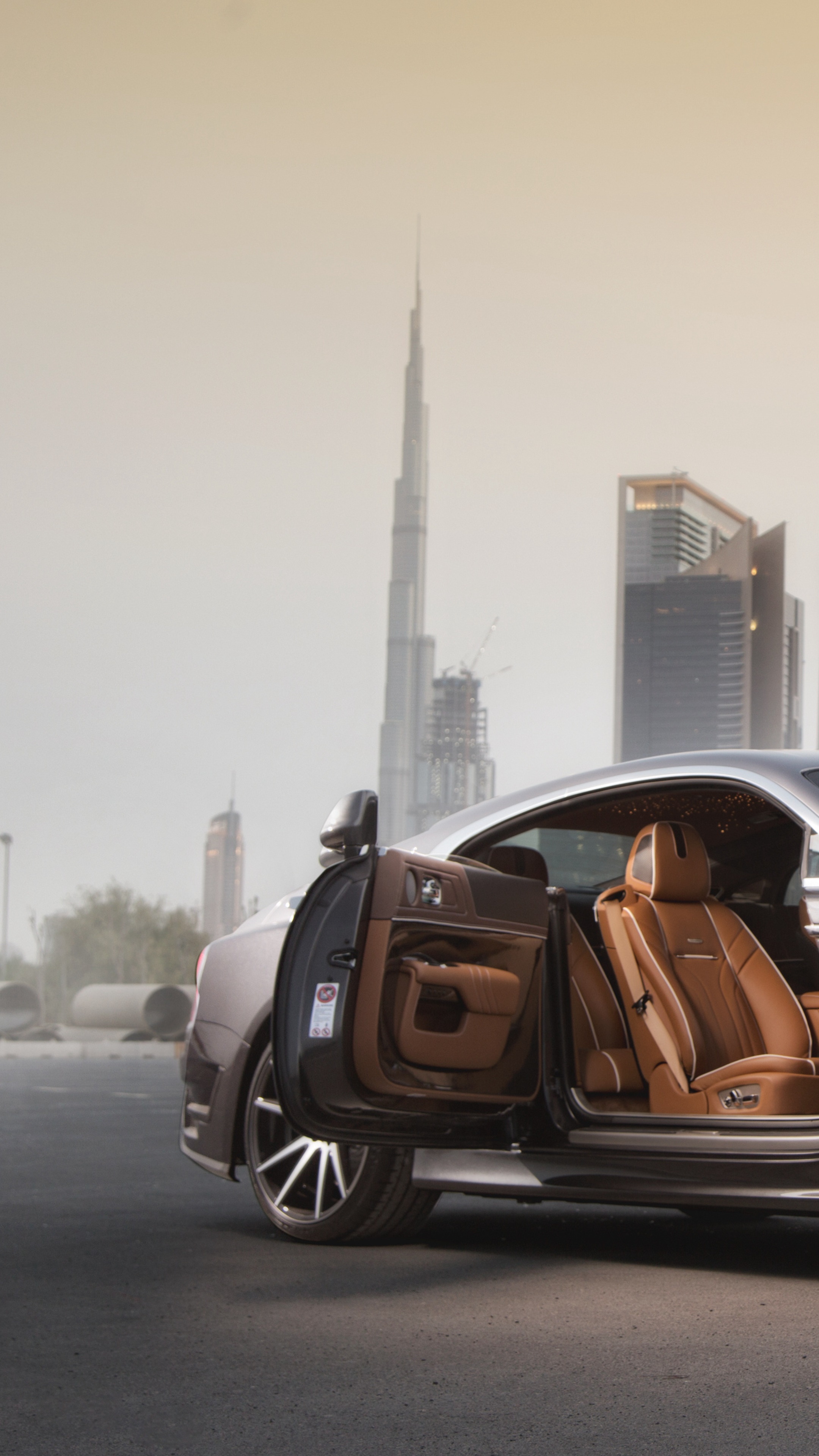 Rolls-Royce Wraith with Dubai skyline HD Phone Wallpaper