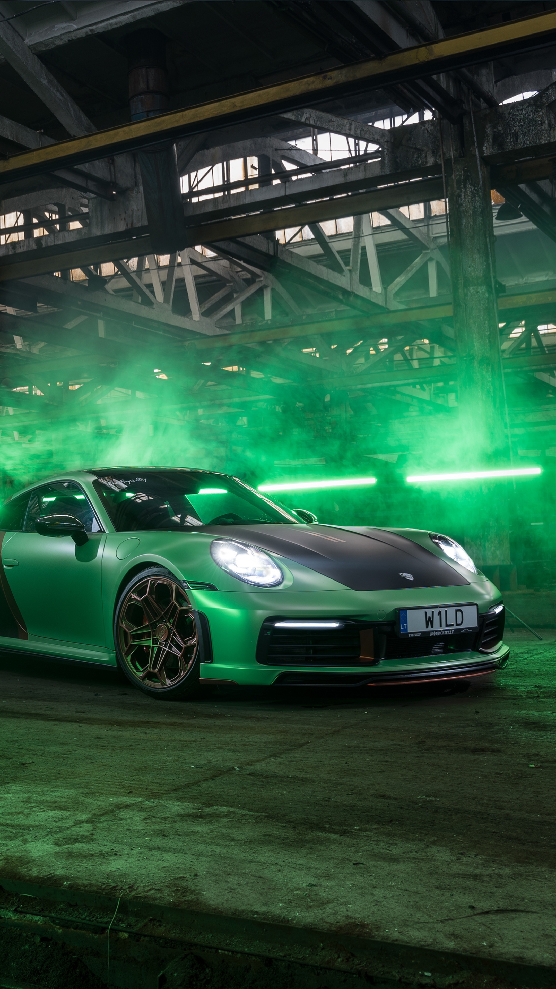 Green Porsche 992 with custom wheels in warehouse HD Phone Wallpaper