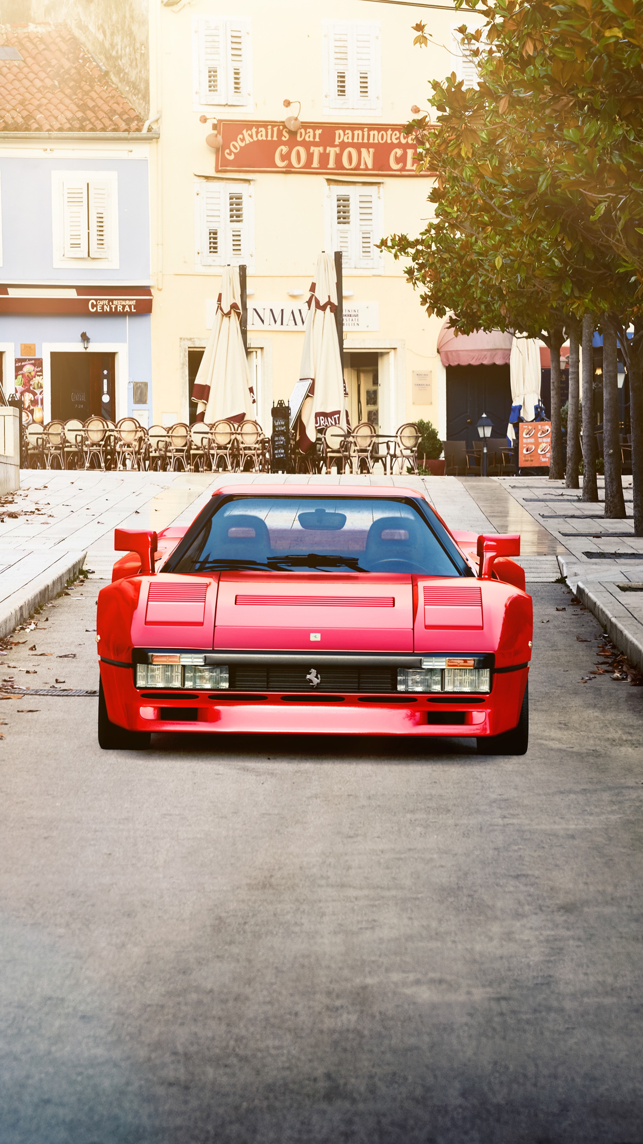 Red Ferrari 288 GTO parked on a street HD Phone Wallpaper