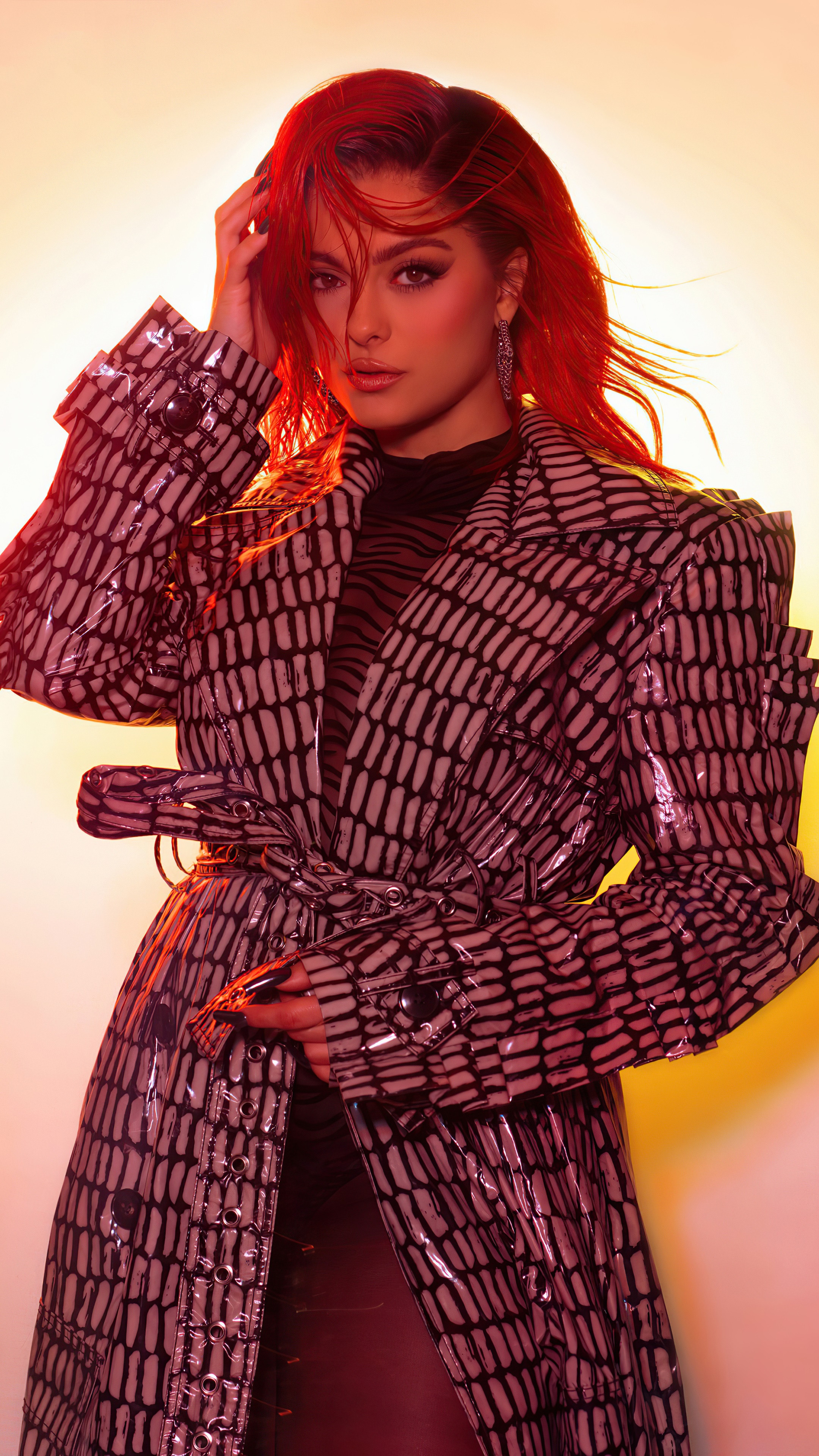 Bebe Rexha in a patterned coat HD Phone Wallpaper