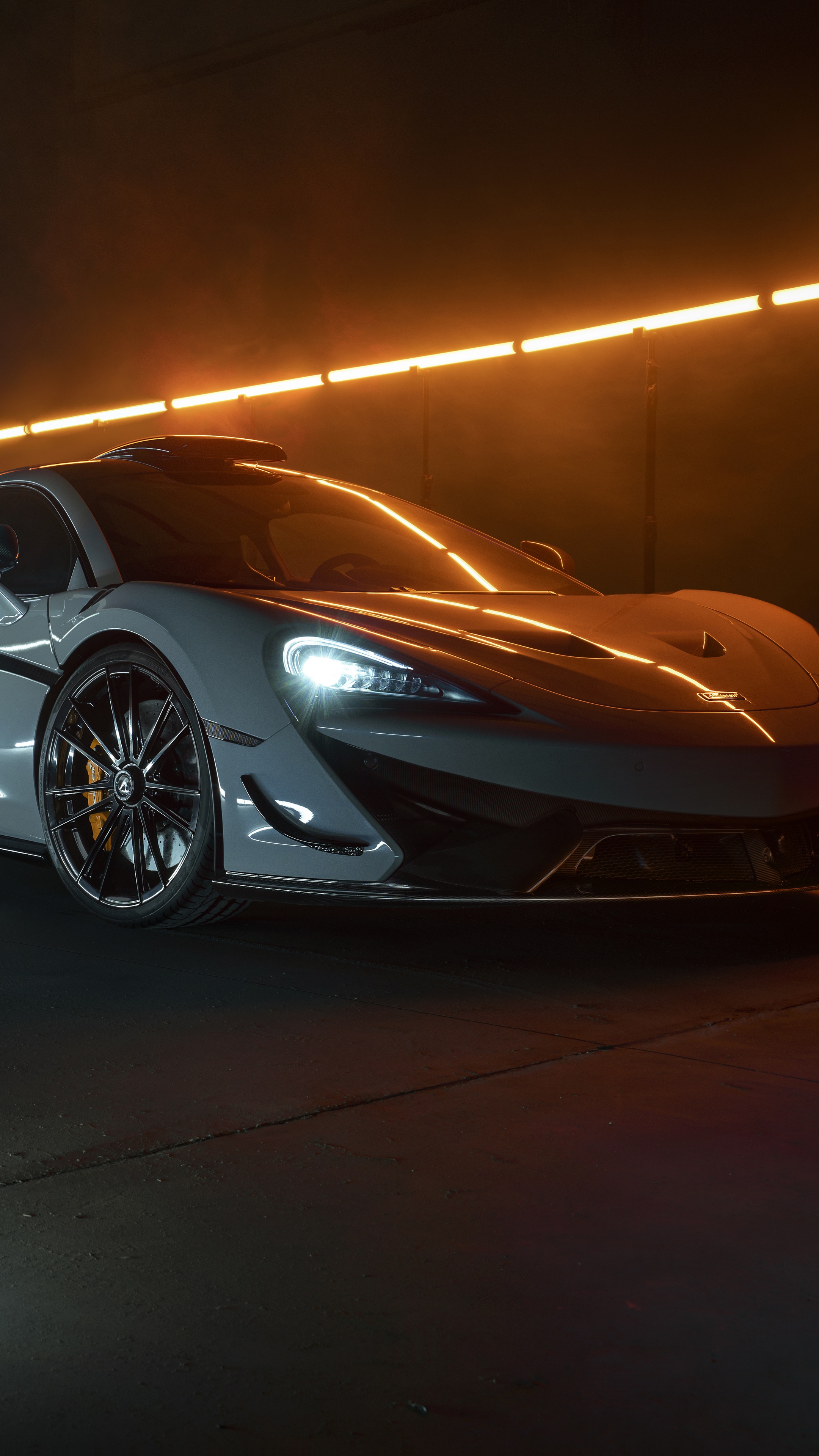 McLaren 620R sports car with orange lighting HD Phone Wallpaper