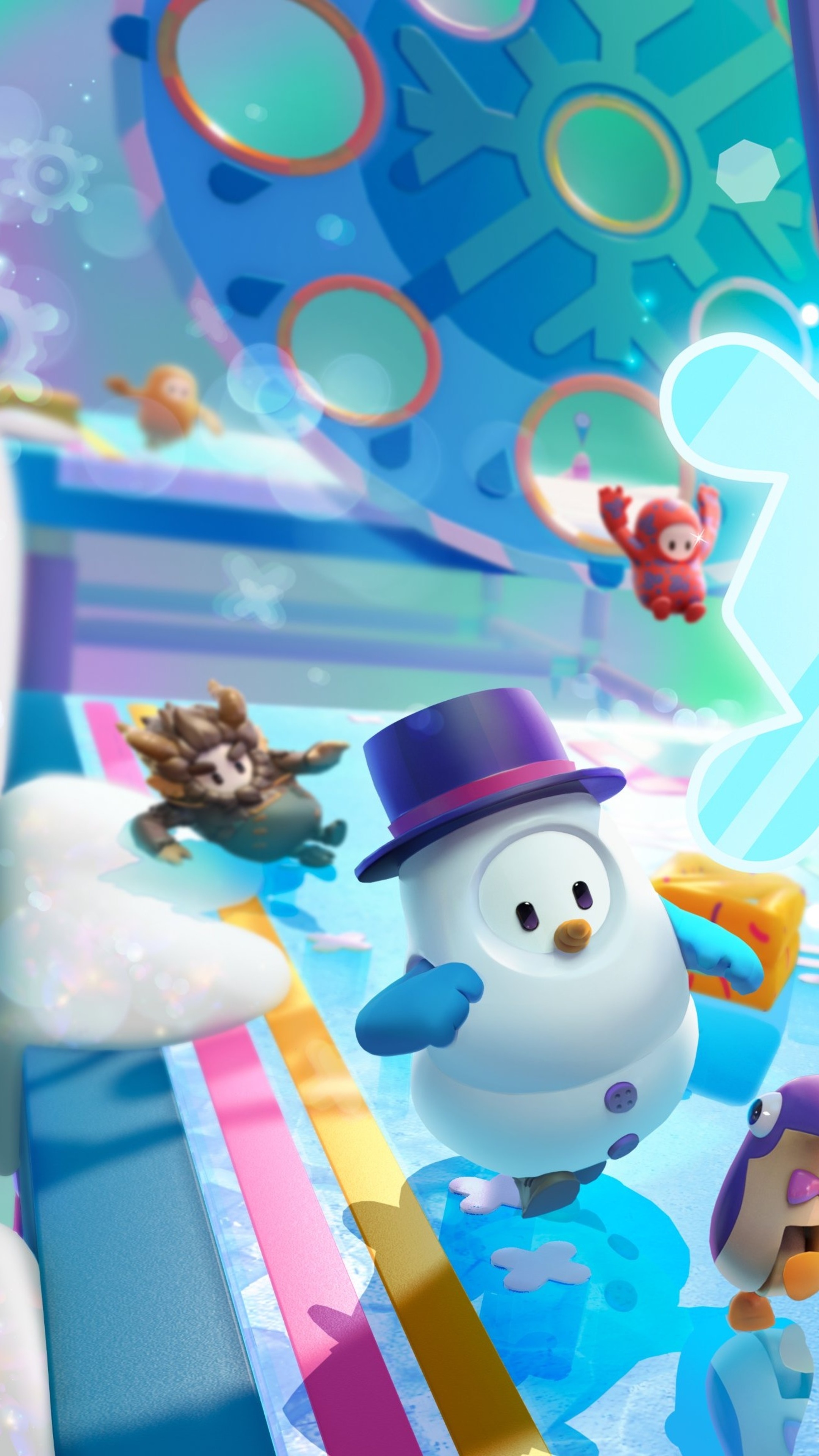 Fall Guys characters on a winter-themed obstacle course HD Phone Wallpaper