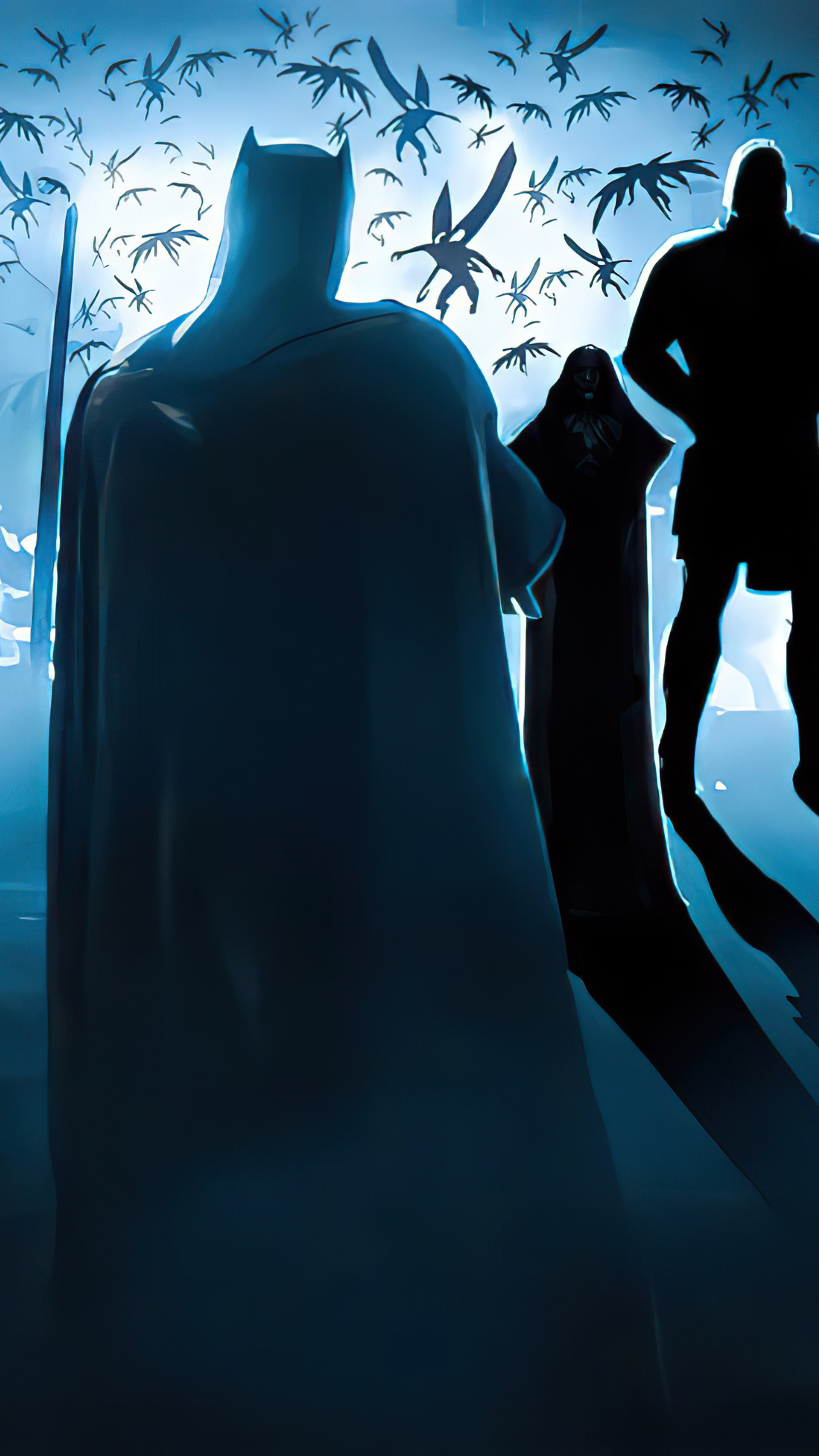 Batman and allies facing creatures HD Phone Wallpaper