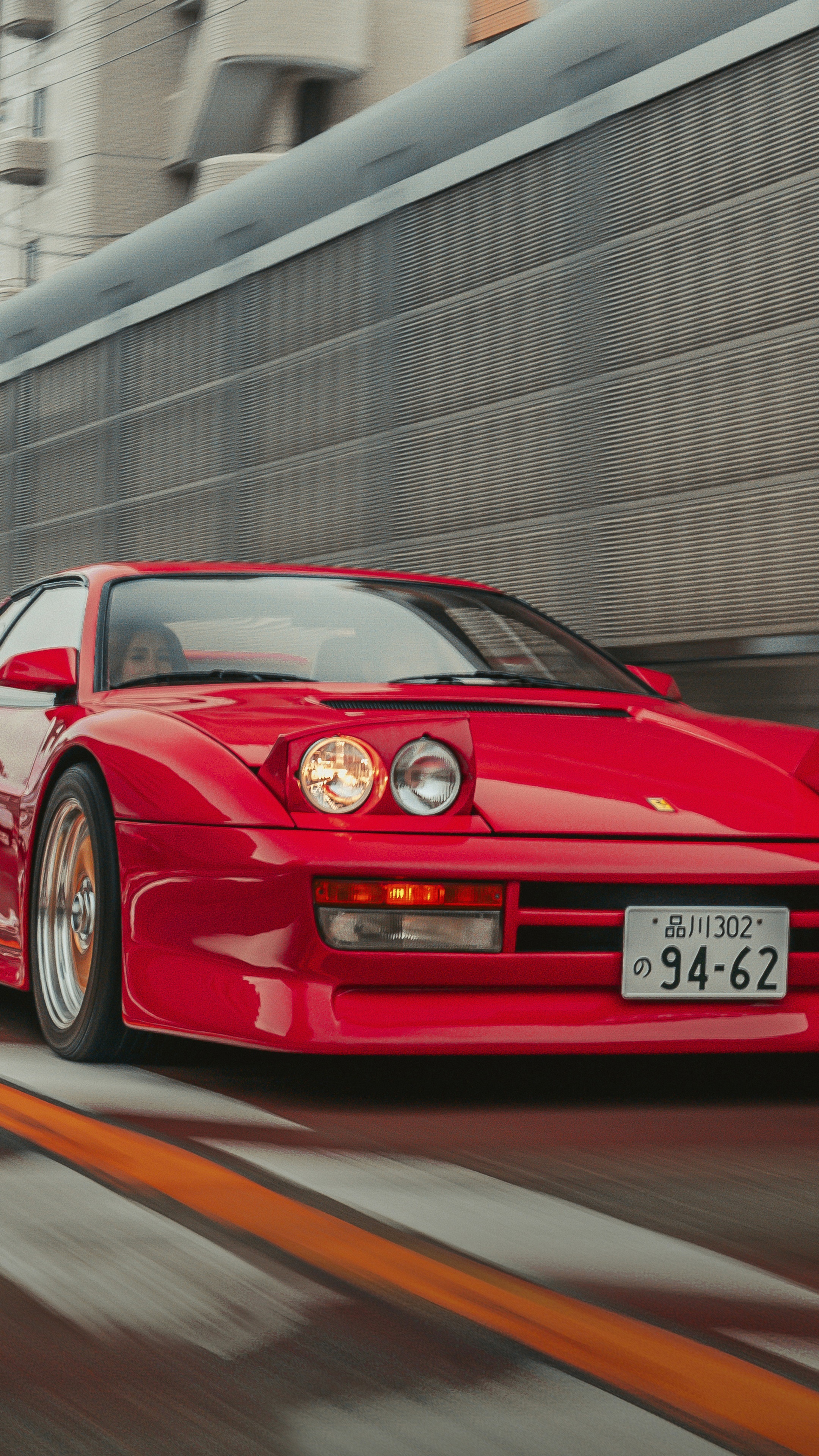 Red Ferrari Testarossa driving on road HD Phone Wallpaper