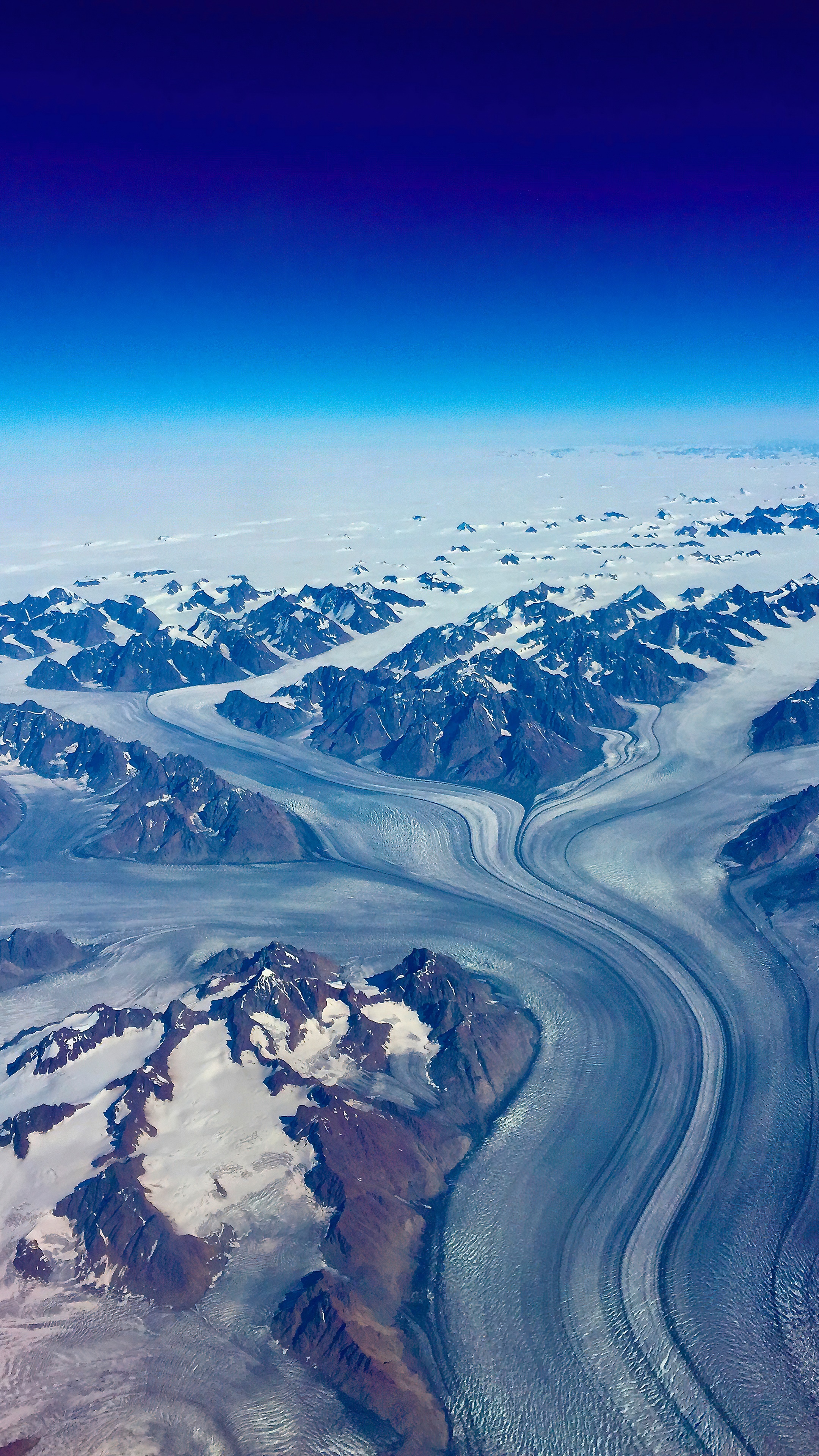 Aerial view of glaciers and snow-capped mountains HD Phone Wallpaper