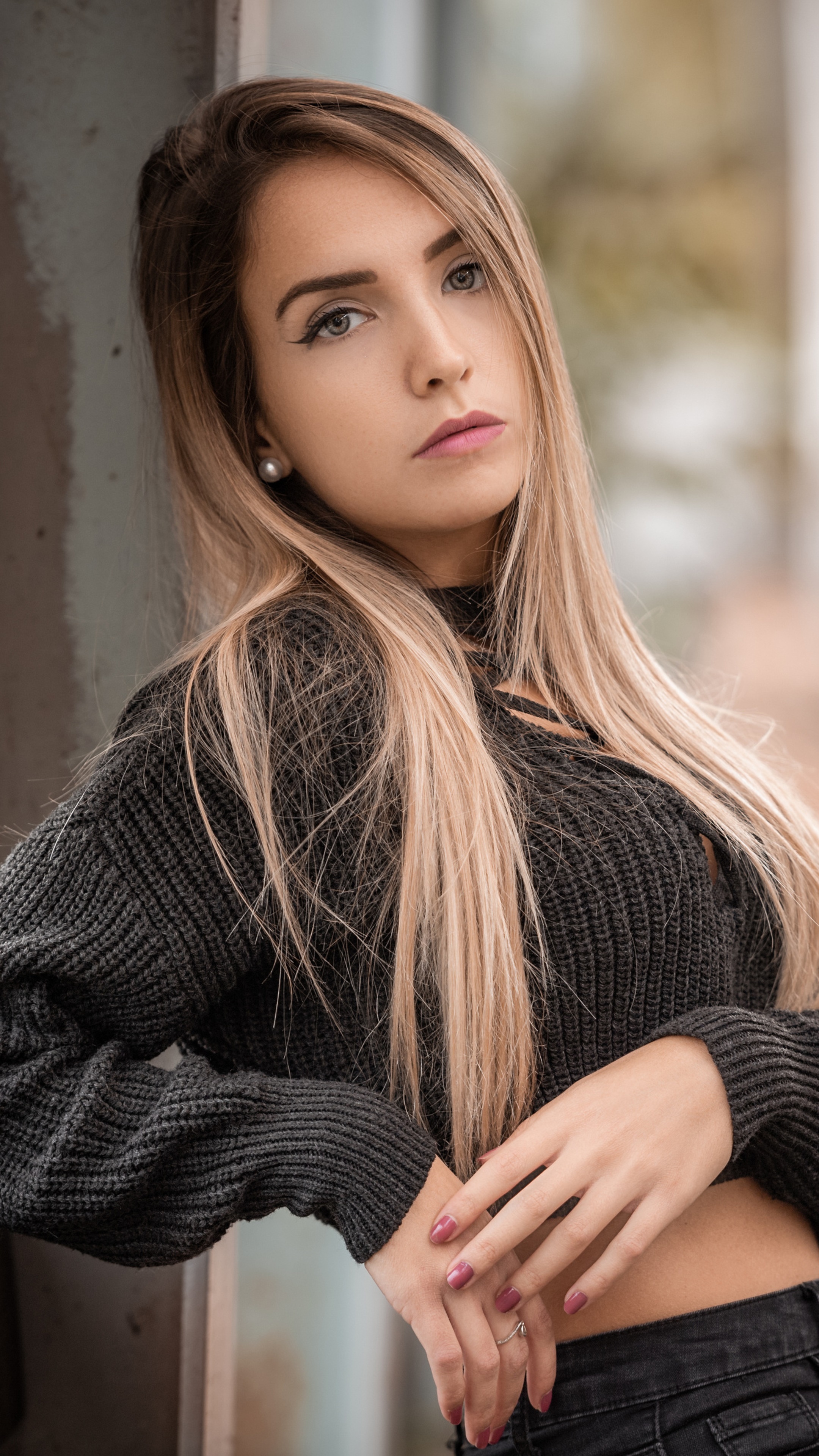 Woman in a black sweater HD Phone Wallpaper