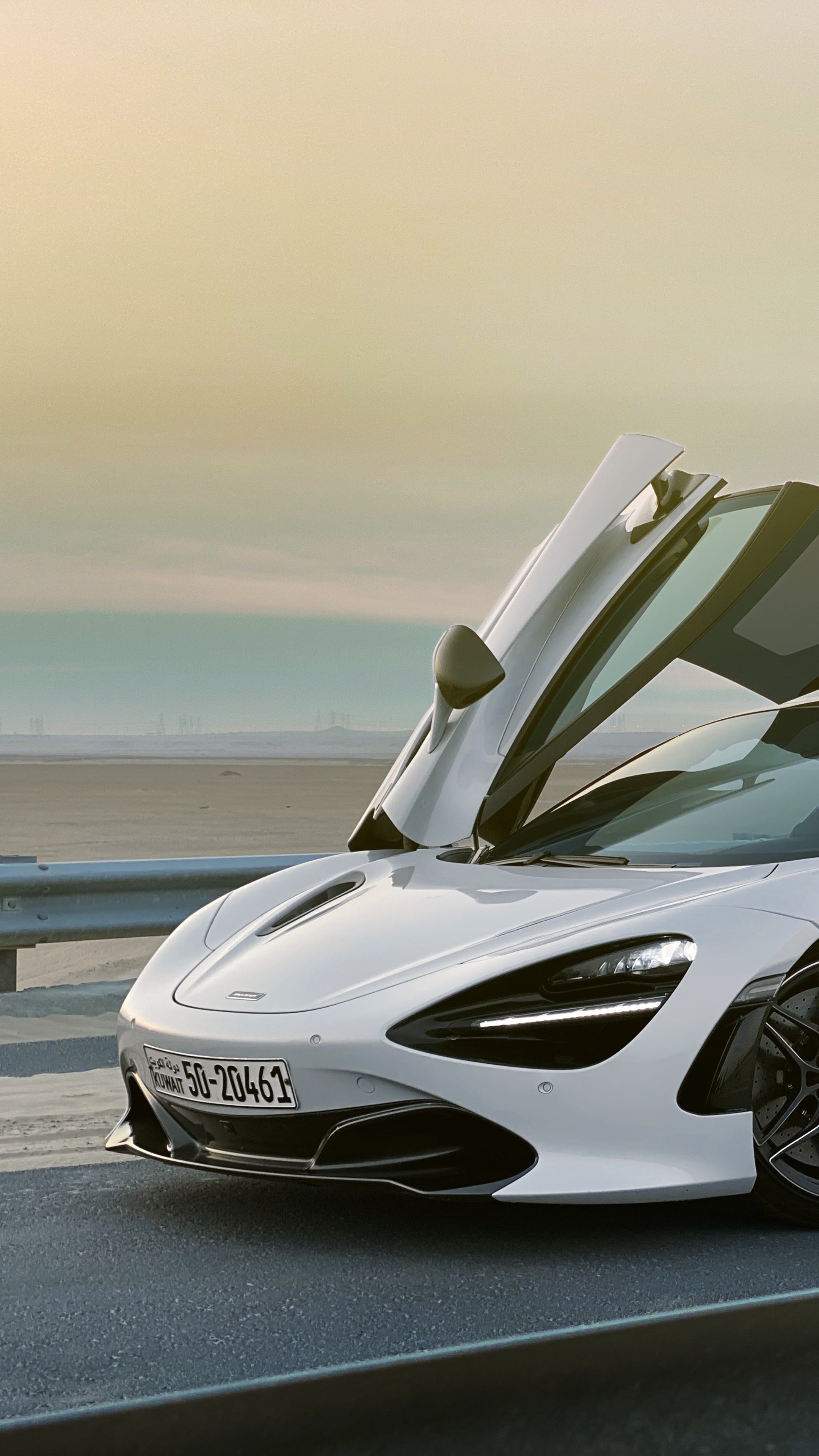 White McLaren 720S with butterfly doors open HD Phone Wallpaper