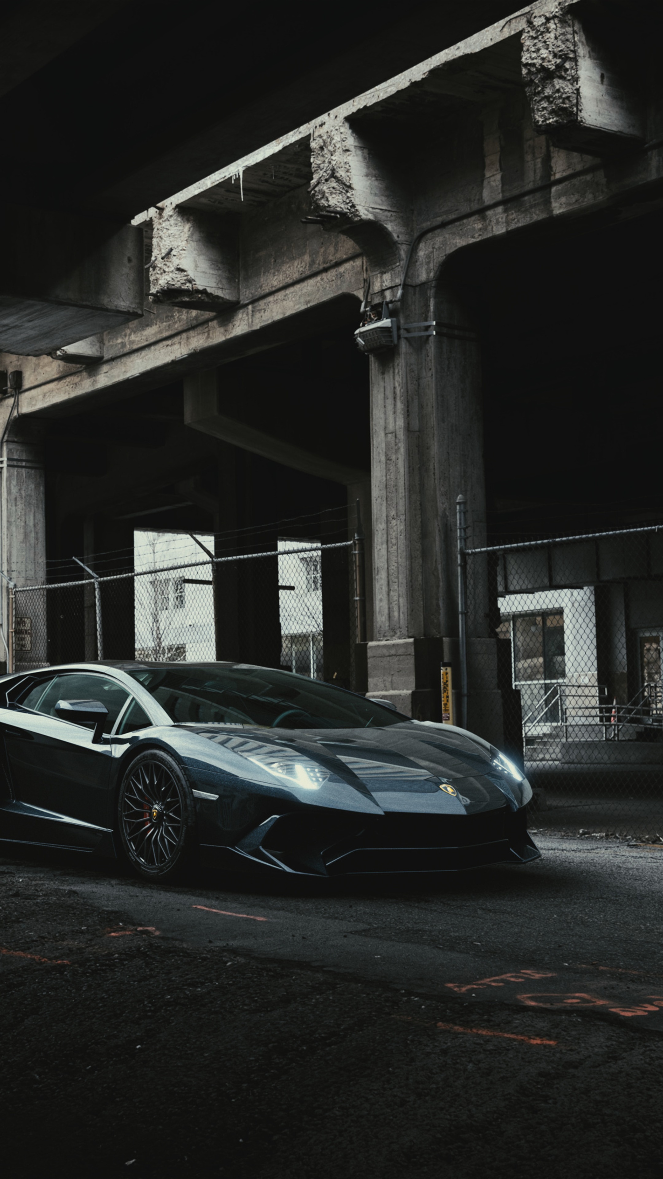 Lamborghini Aventador parked under concrete structure HD Phone Wallpaper