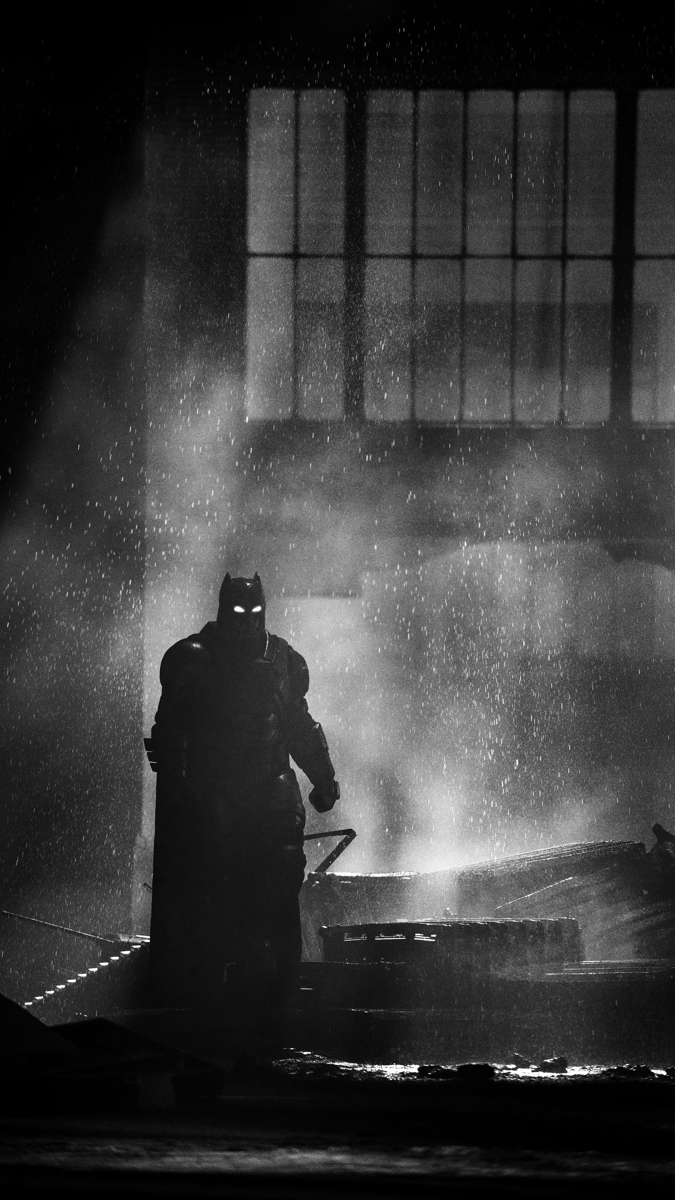 Batman in a dark industrial setting HD Phone Wallpaper