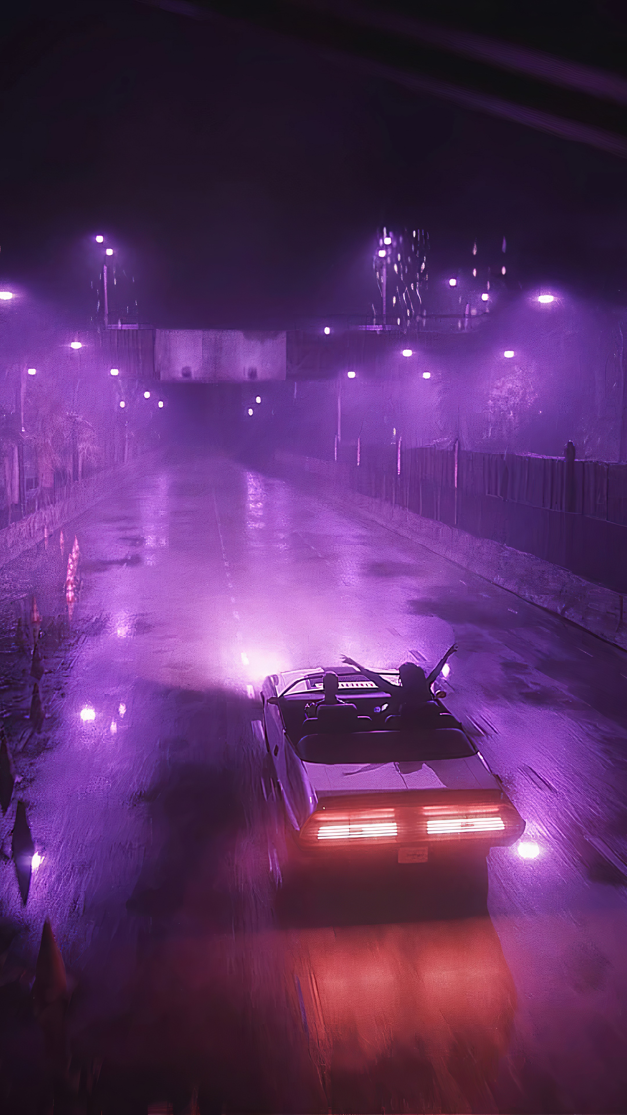 Couple in convertible driving at night HD Phone Wallpaper