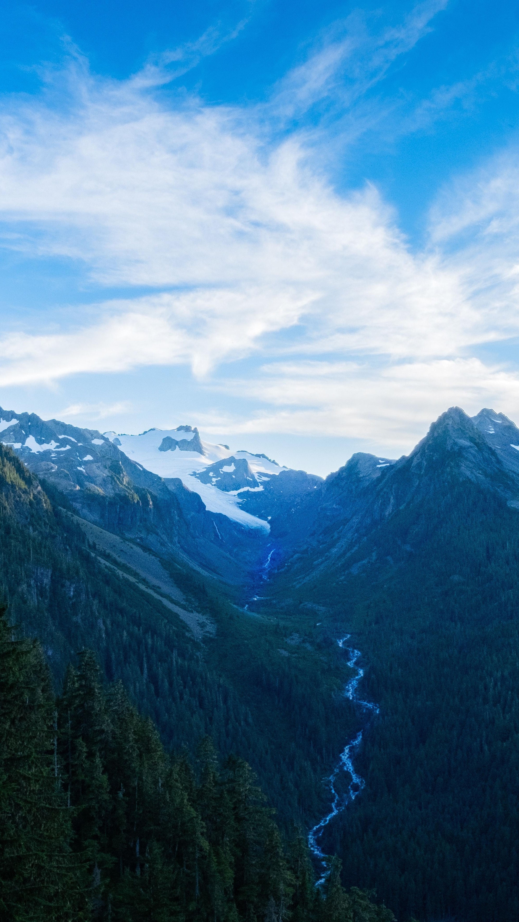 Mountain valley with river and snow-capped peaks HD Phone Wallpaper