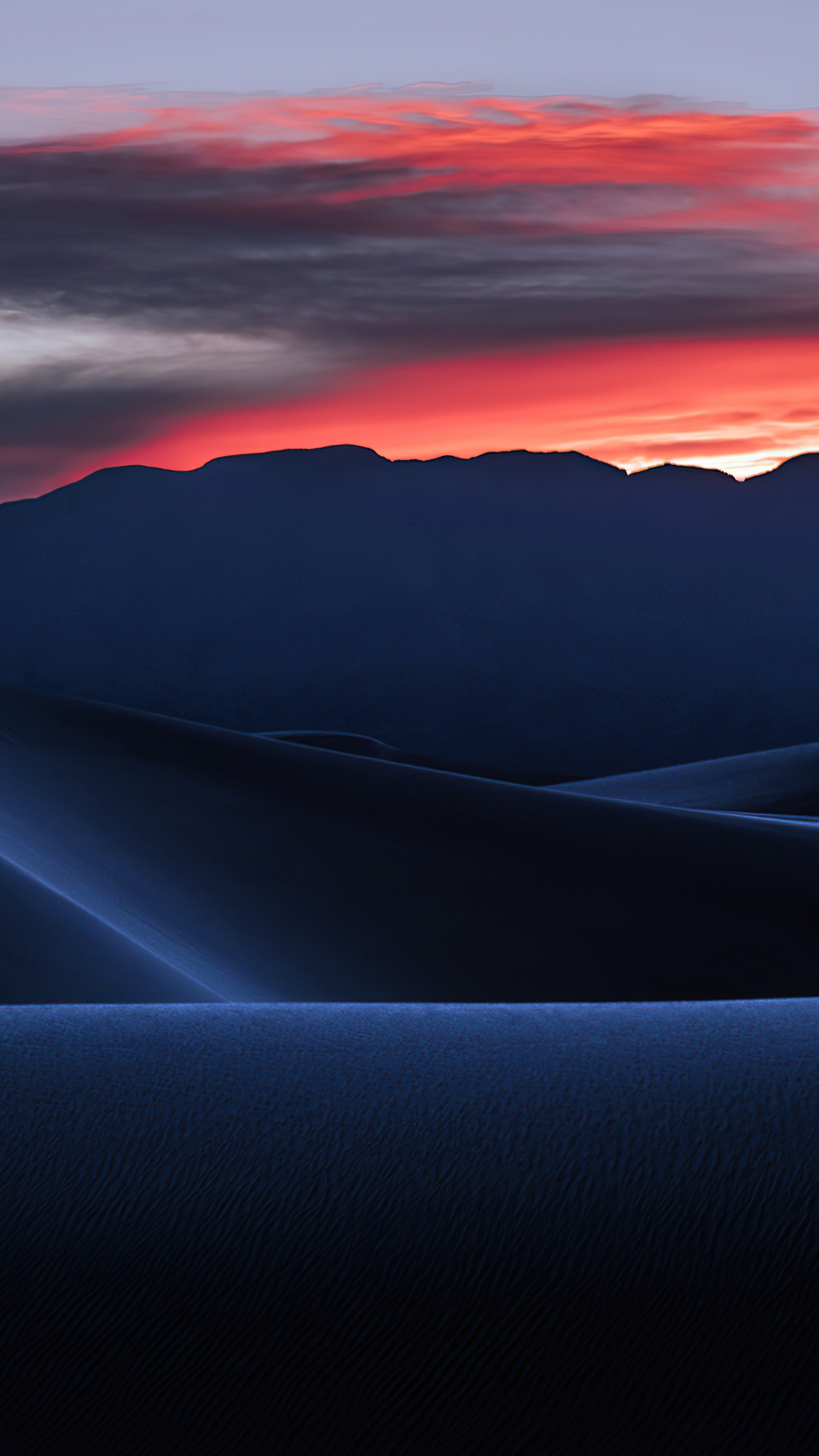 Desert dunes at sunset with mountain silhouette HD Phone Wallpaper