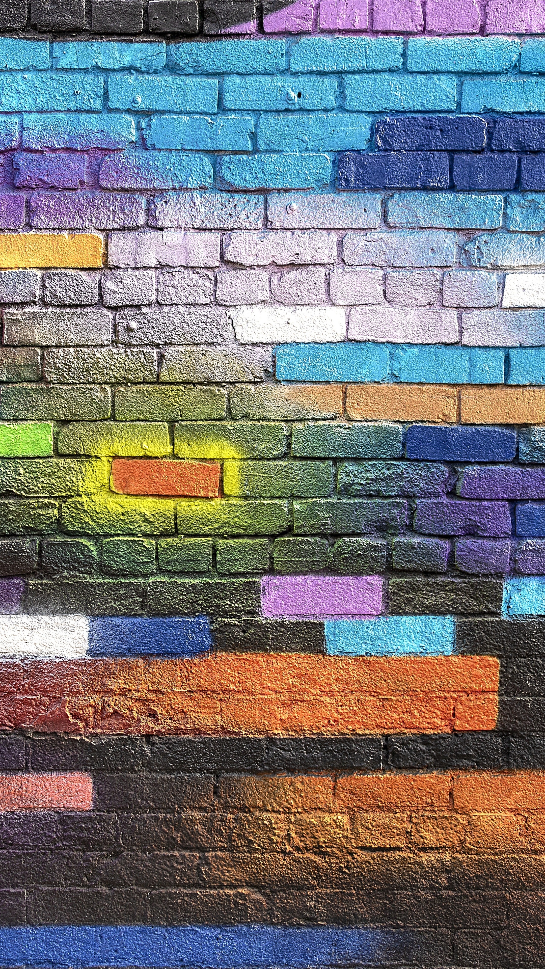 Colorful graffiti on a brick wall HD Phone Wallpaper