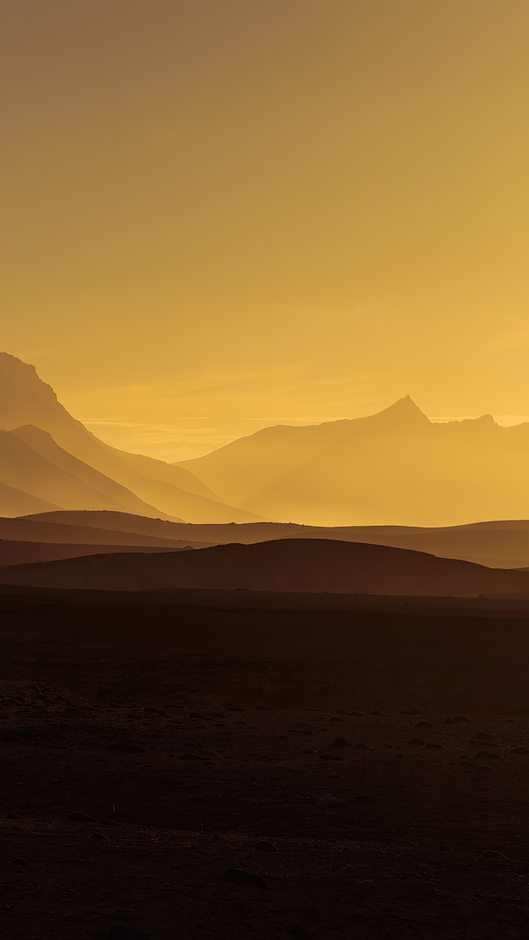 Mountains at sunrise in golden light HD Phone Wallpaper