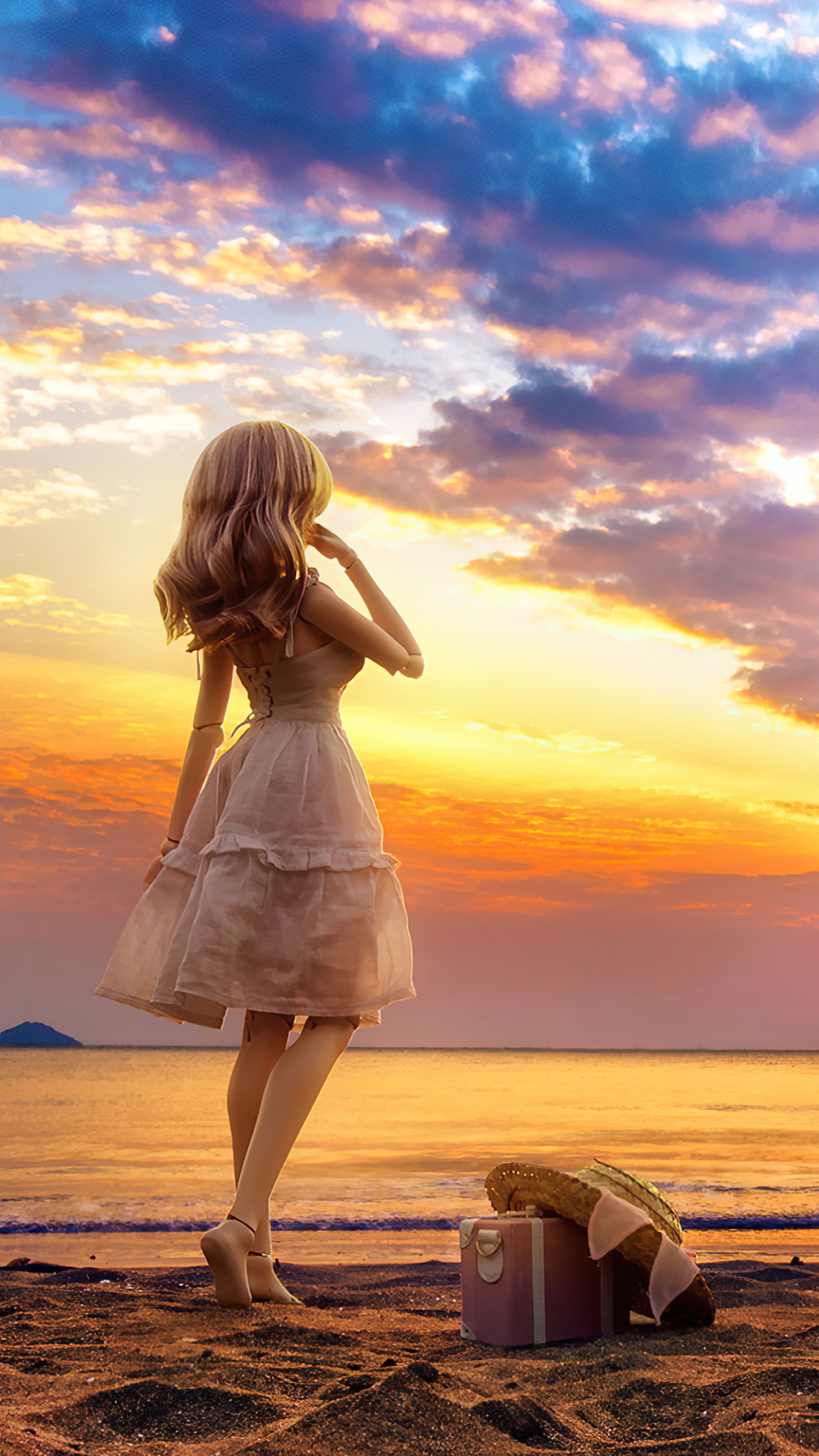 Doll on a beach at sunset HD Phone Wallpaper