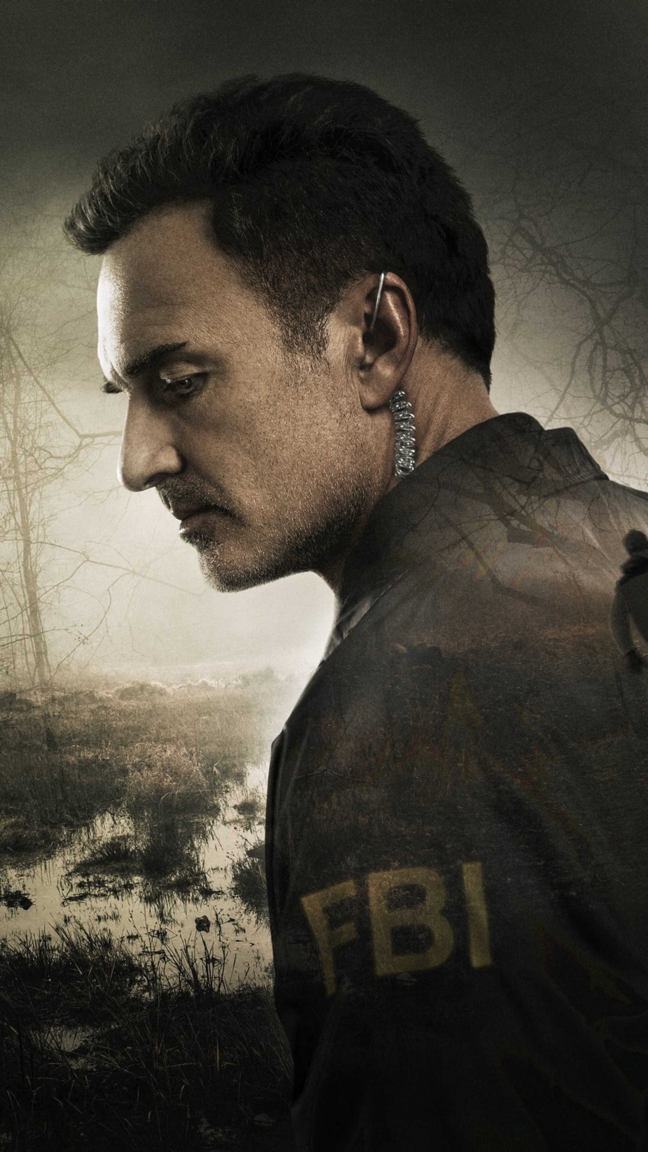 FBI agent in a swampy landscape HD Phone Wallpaper