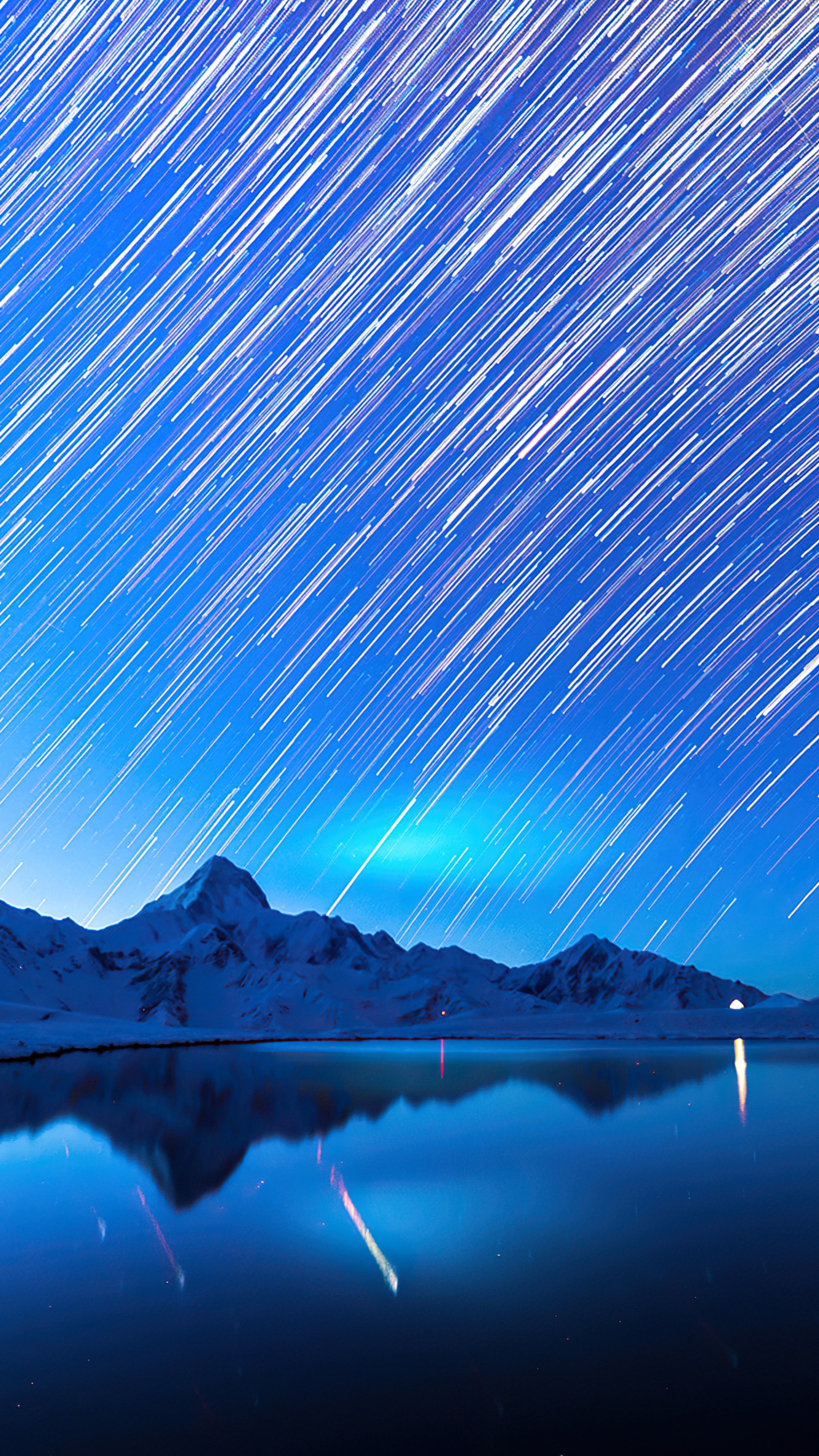 Star trails over snowy mountains and lake HD Phone Wallpaper