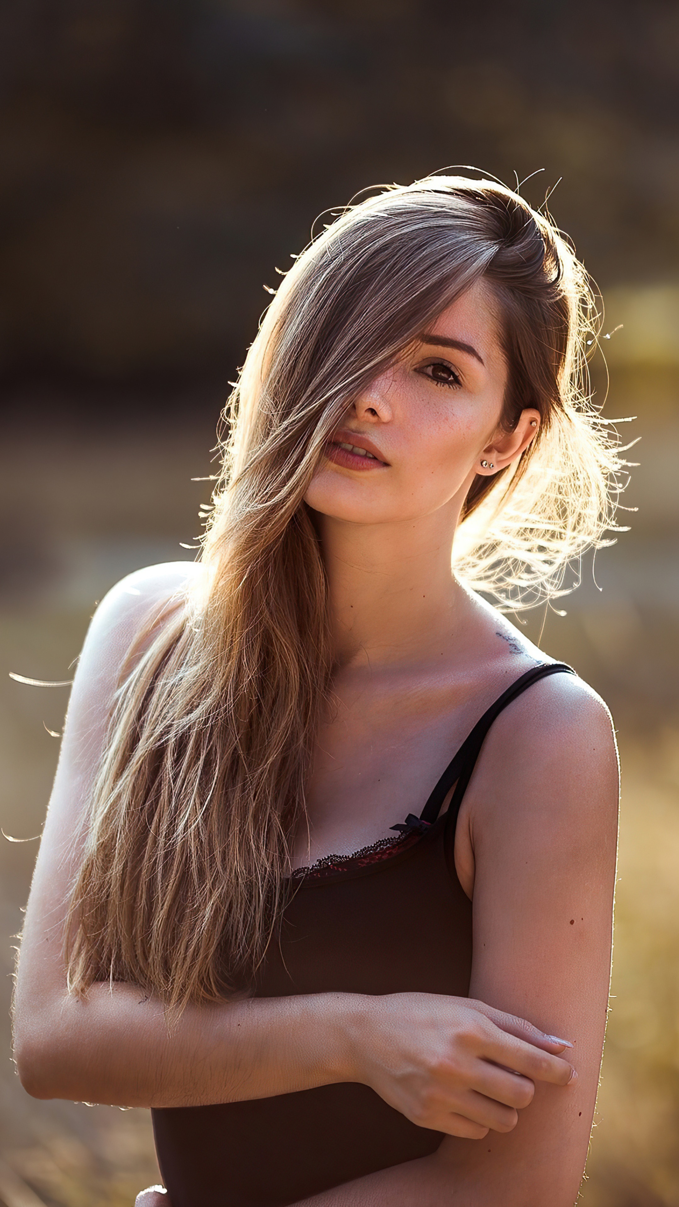 Model with long blonde hair in a black top HD Phone Wallpaper