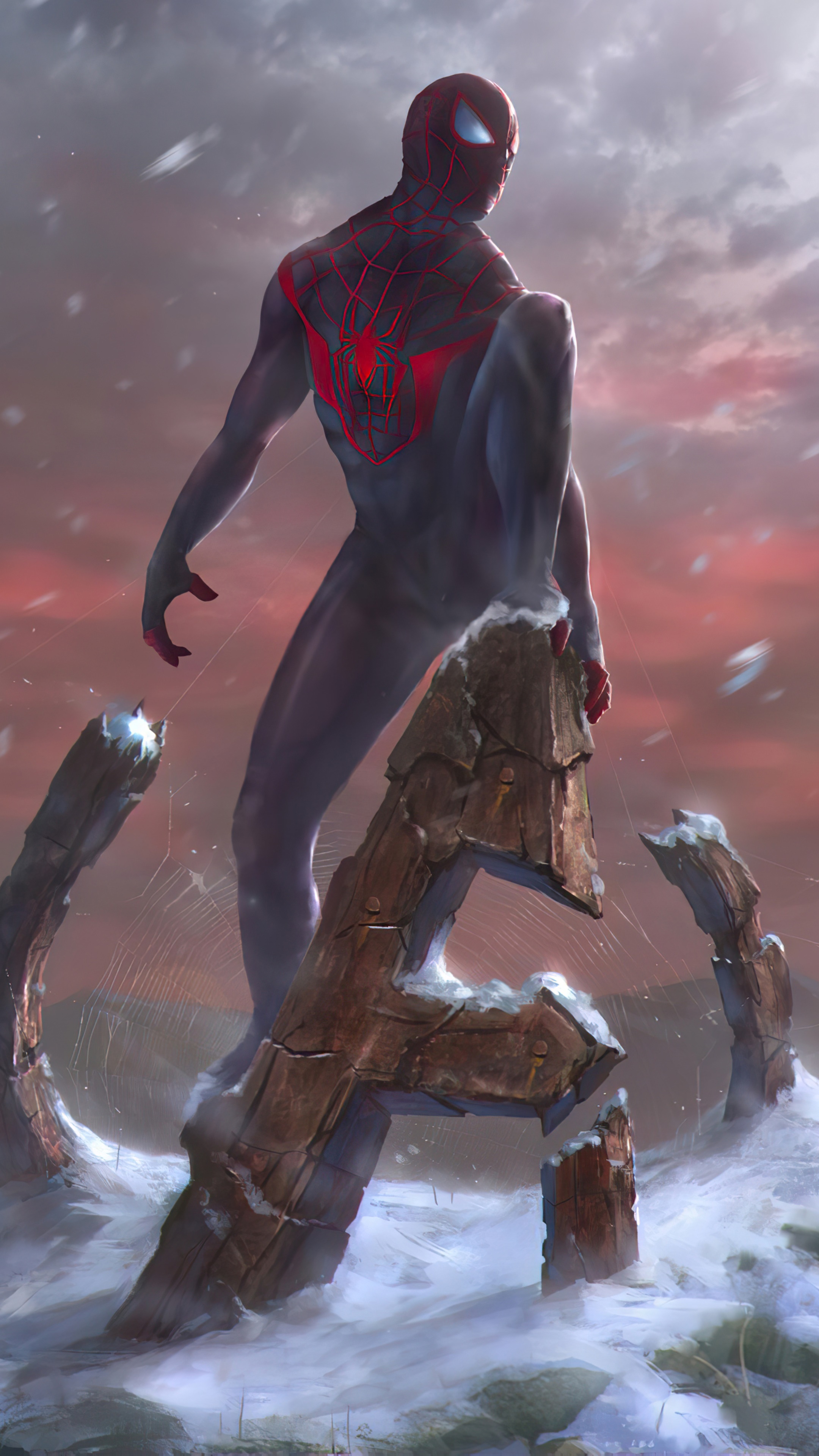 Spider-Man standing on broken stone letters in a snowy landscape HD Phone Wallpaper