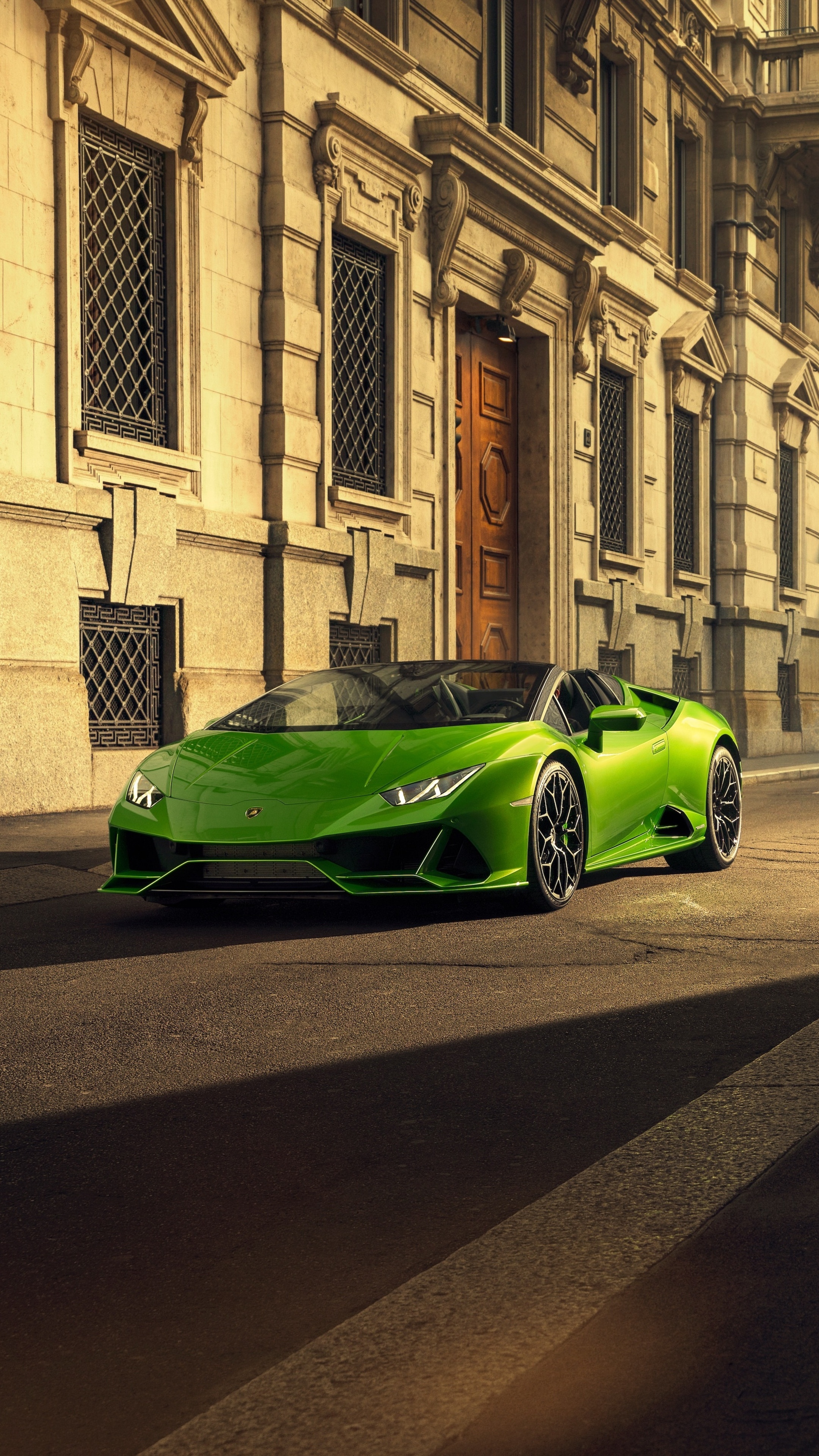Green Lamborghini Huracan Evo Spyder parked on street HD Phone Wallpaper