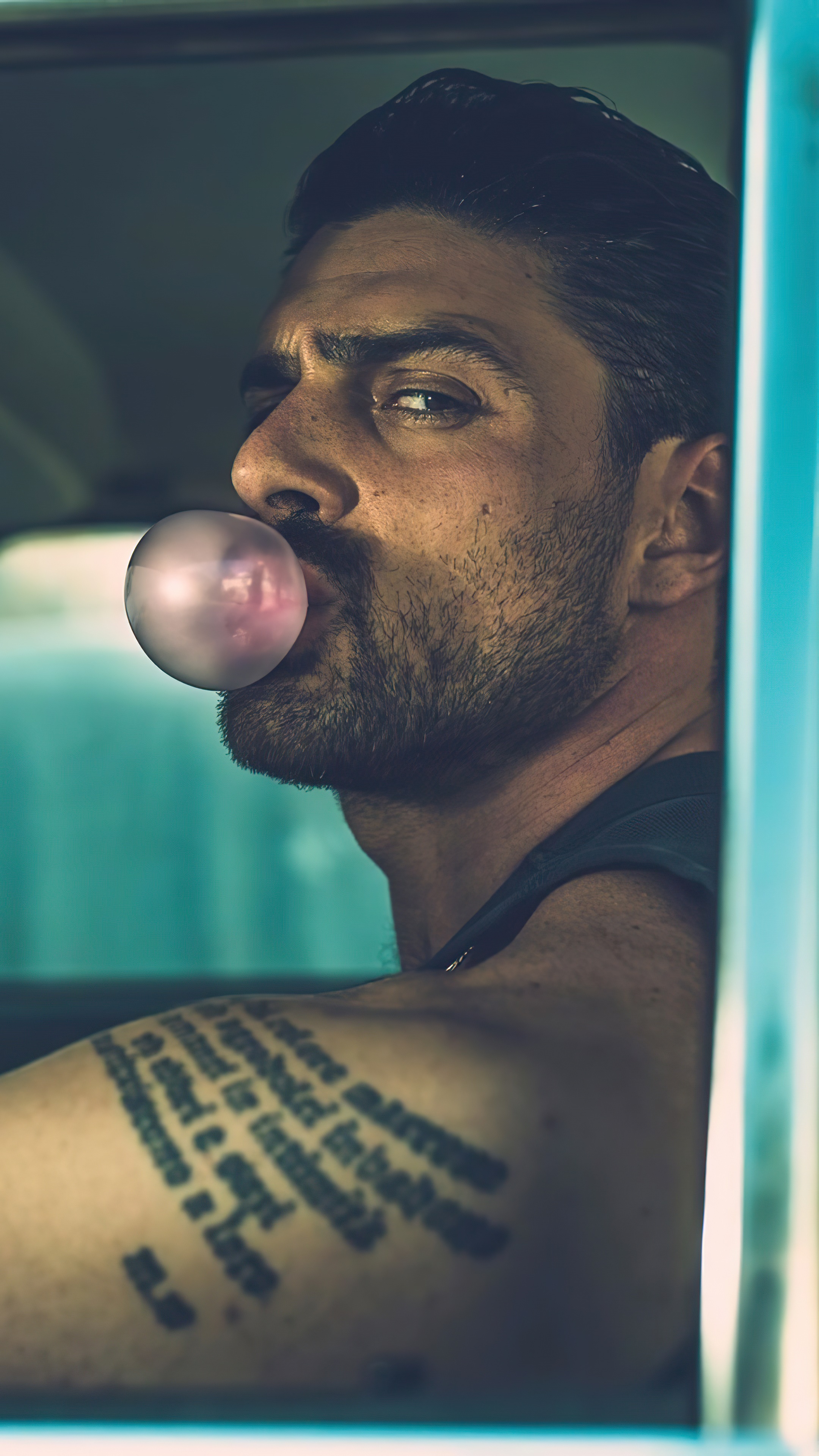 Michele Morrone blowing bubble gum HD Phone Wallpaper